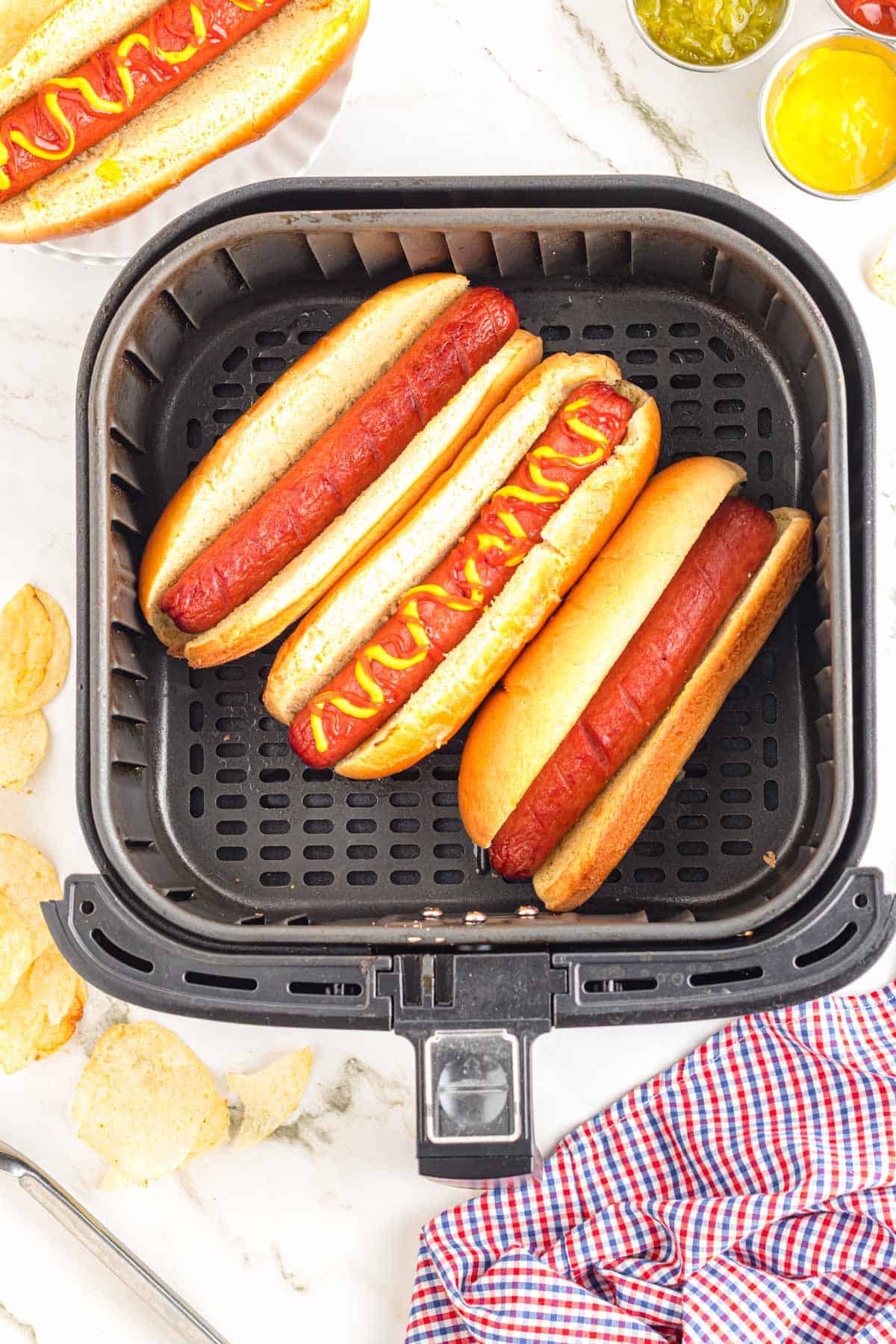 Air Fryer Hot Dogs are a simple and delish lunch or dinner dish the whole family will love.