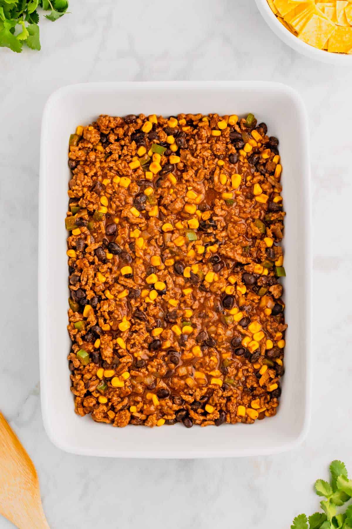 beef enchilada mixture in a baking dish