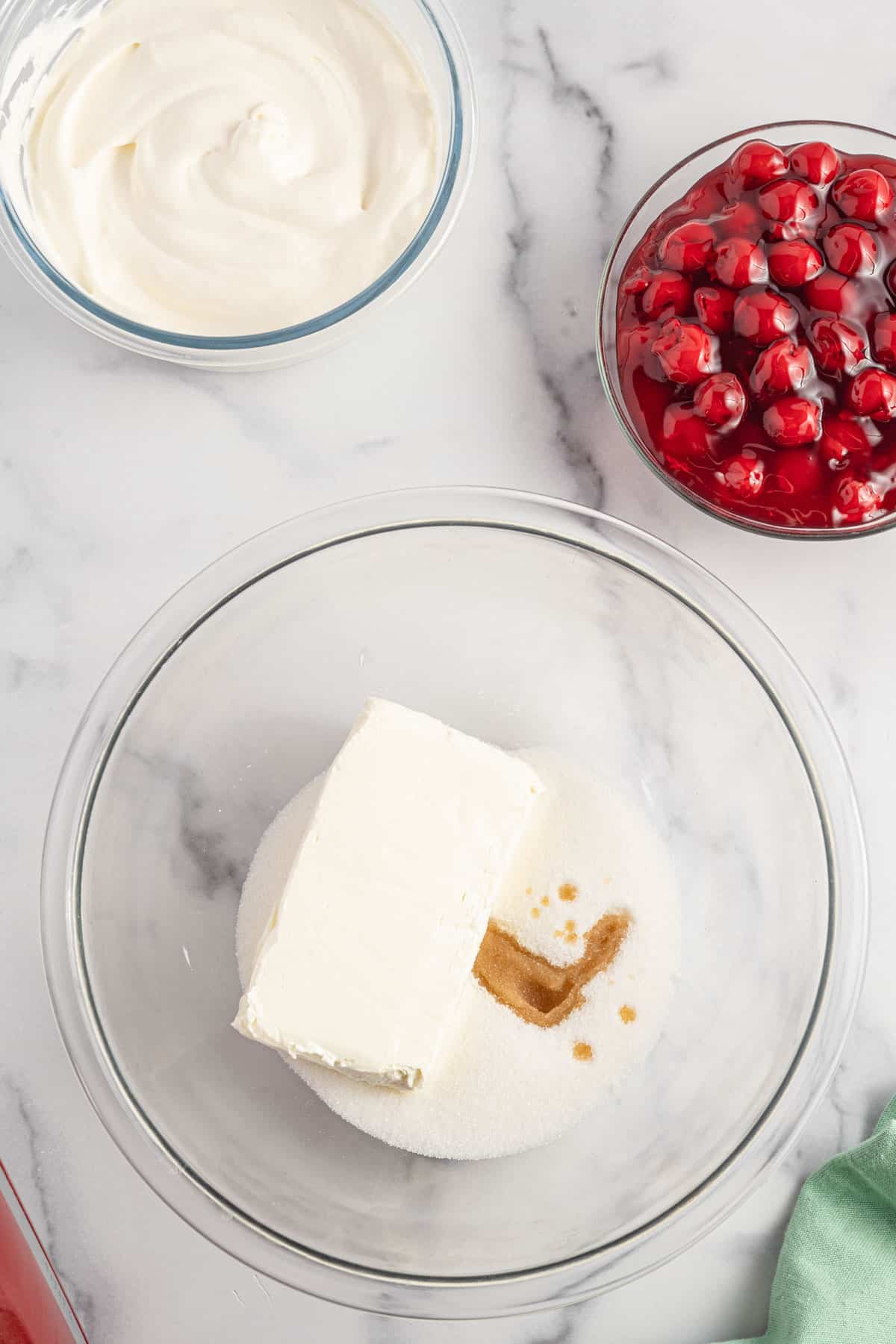 granulated sugar, softened cream cheese and vanilla extract in a mixing bowl