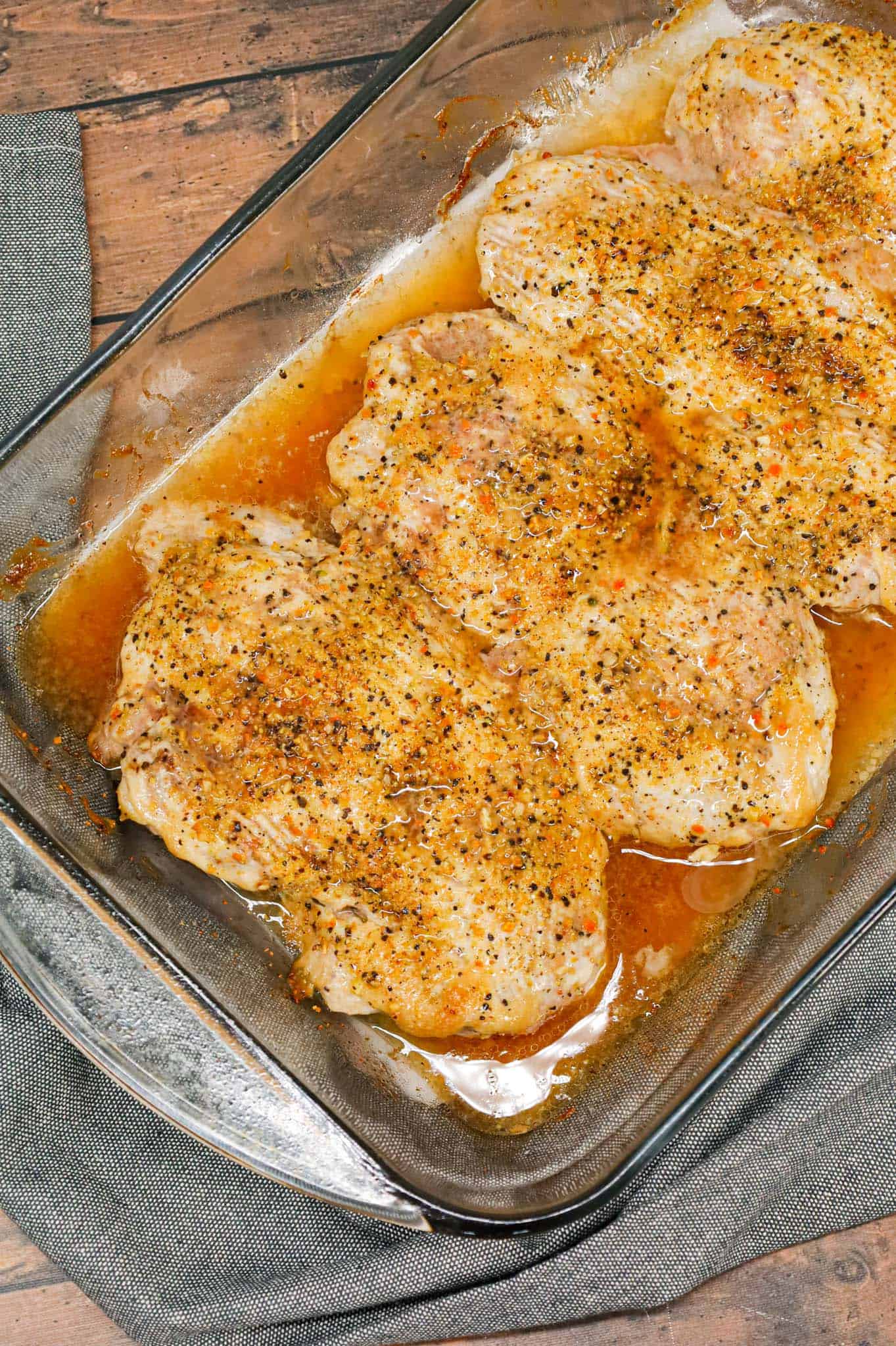 Lemon Pepper Pork Chops are simple baked pork chops coated in mayo, Worcestershire sauce, garlic powder and lemon pepper seasoning.