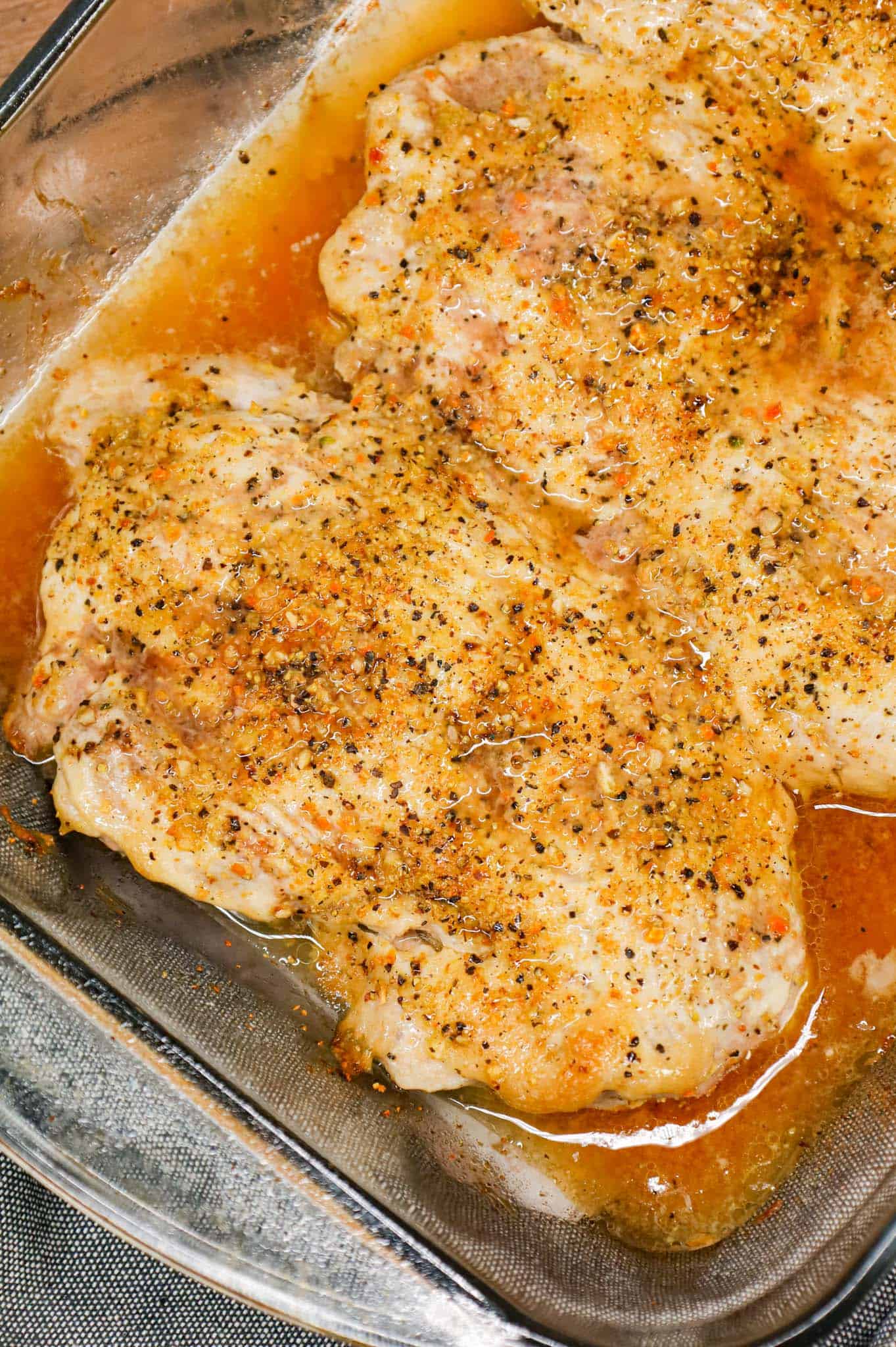 Lemon Pepper Pork Chops are simple baked pork chops coated in mayo, Worcestershire sauce, garlic powder and lemon pepper seasoning.