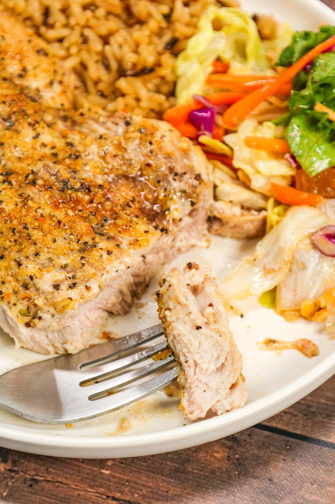 Lemon Pepper Pork Chops are simple baked pork chops coated in mayo, Worcestershire sauce, garlic powder and lemon pepper seasoning.