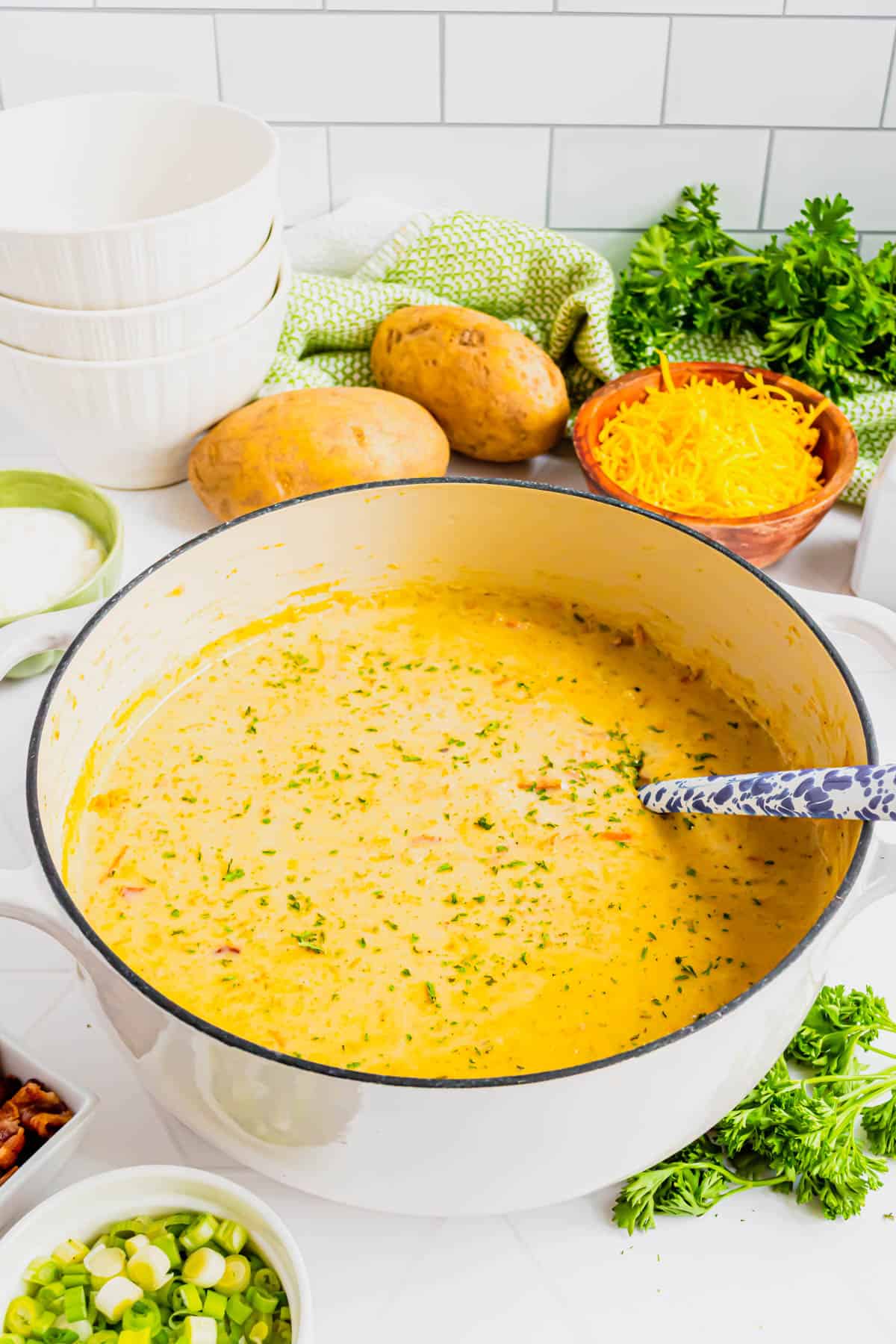 Loaded Baked Potato Soup is a hearty soup recipe loaded with russet potatoes, bacon, cheddar cheese, onions, chicken broth and cream.