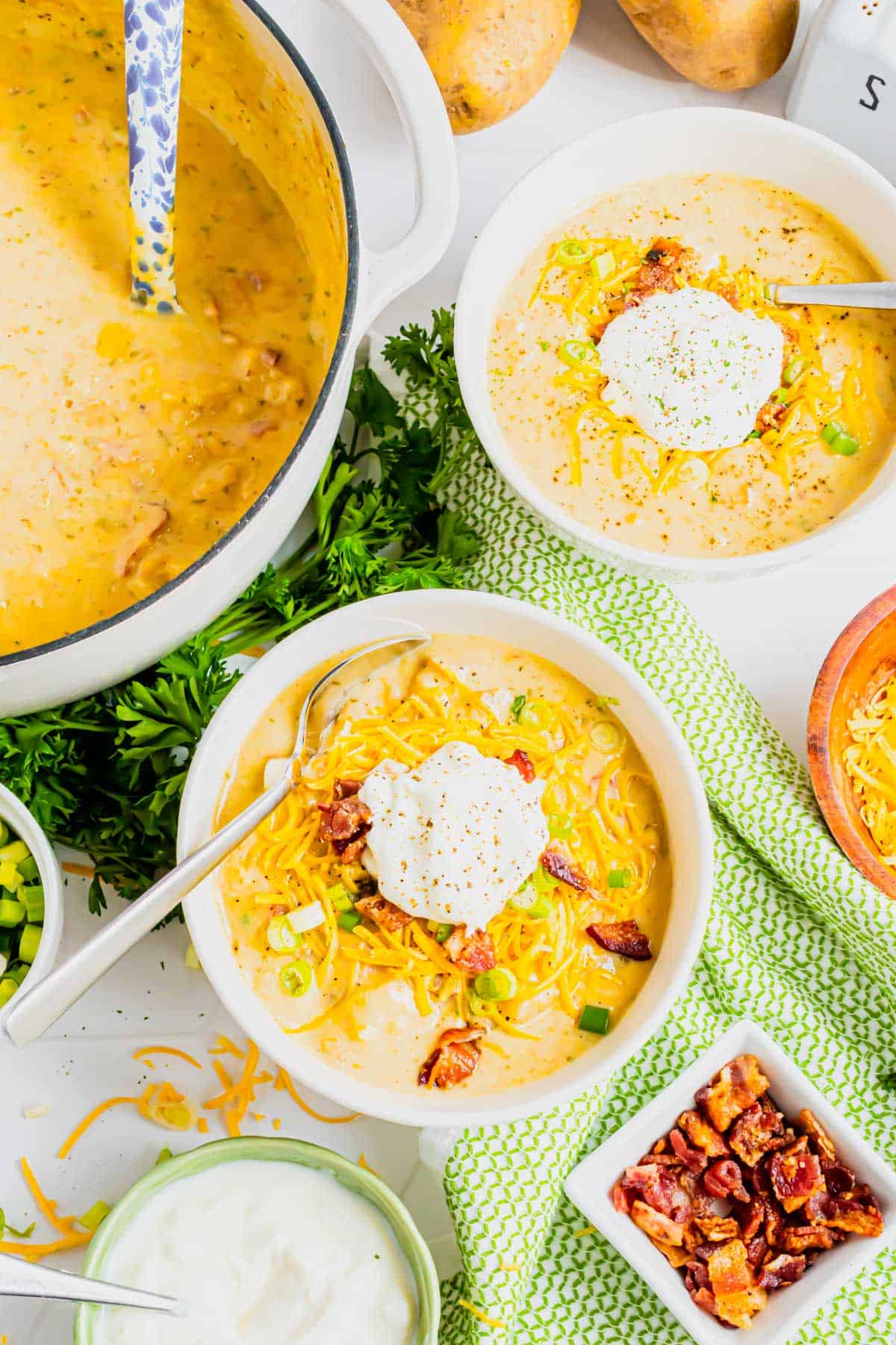 Loaded Baked Potato Soup is a hearty soup recipe loaded with russet potatoes, bacon, cheddar cheese, onions, chicken broth and cream.