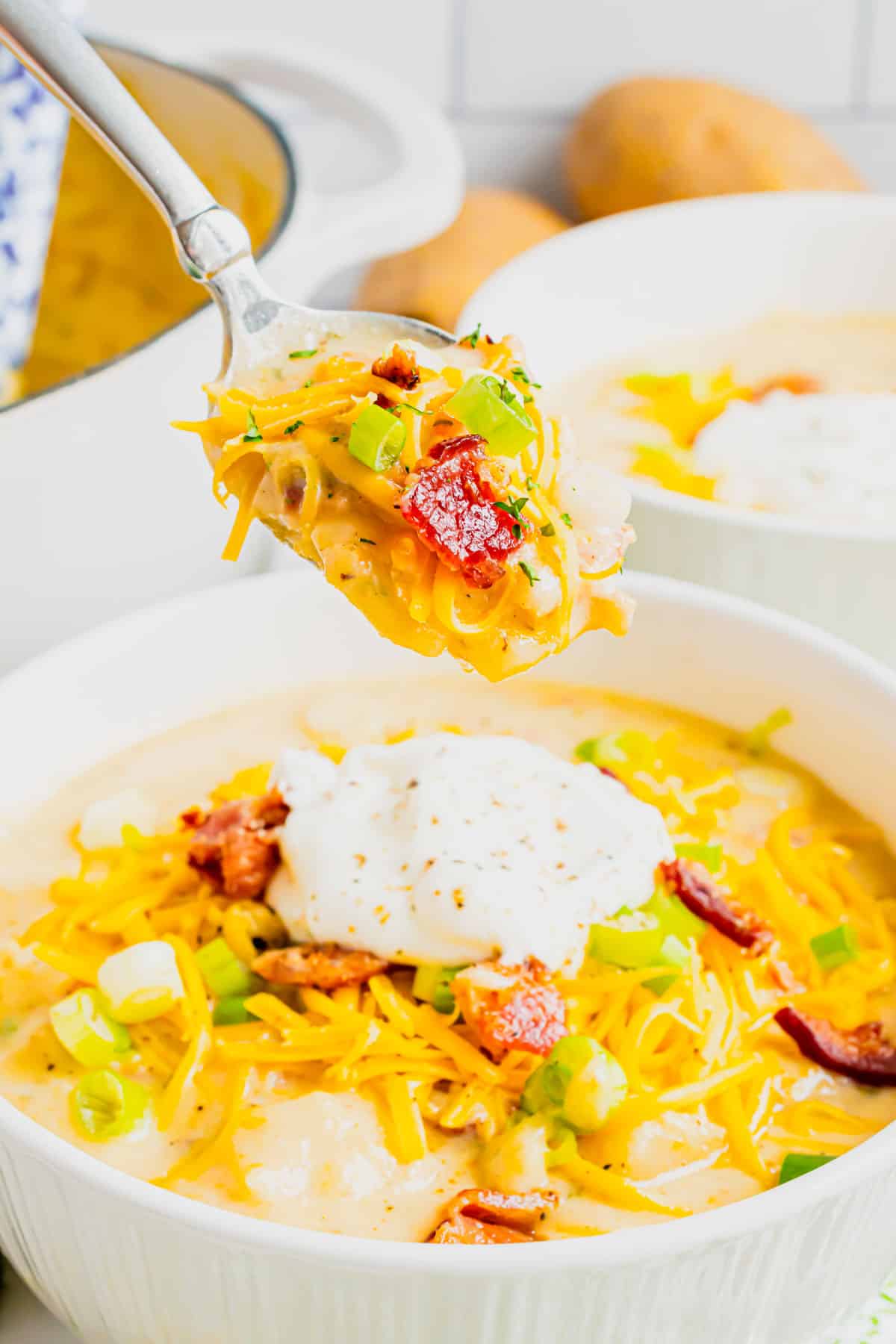 Loaded Baked Potato Soup is a hearty soup recipe loaded with russet potatoes, bacon, cheddar cheese, onions, chicken broth and cream.