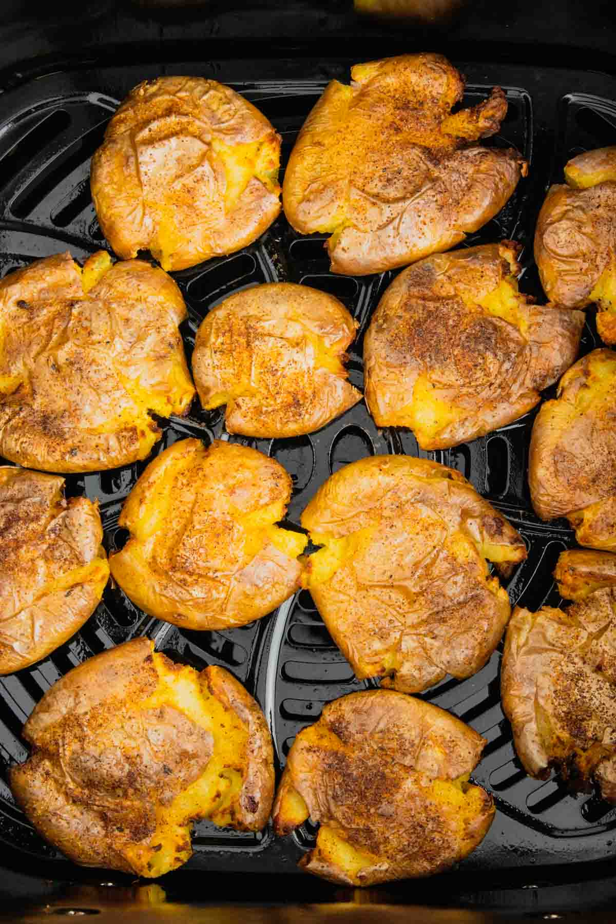 Air Fryer Smashed Potatoes are tasty seasoned baby potatoes with a crispy outside and a fluffy center.