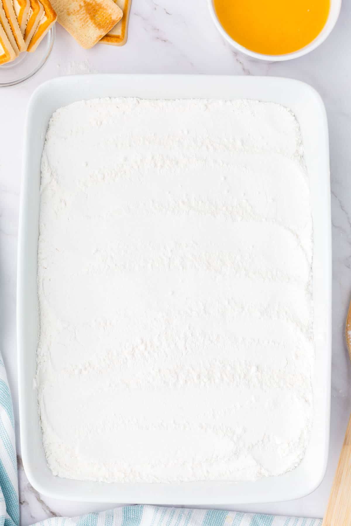 vanilla cake mix in a baking dish