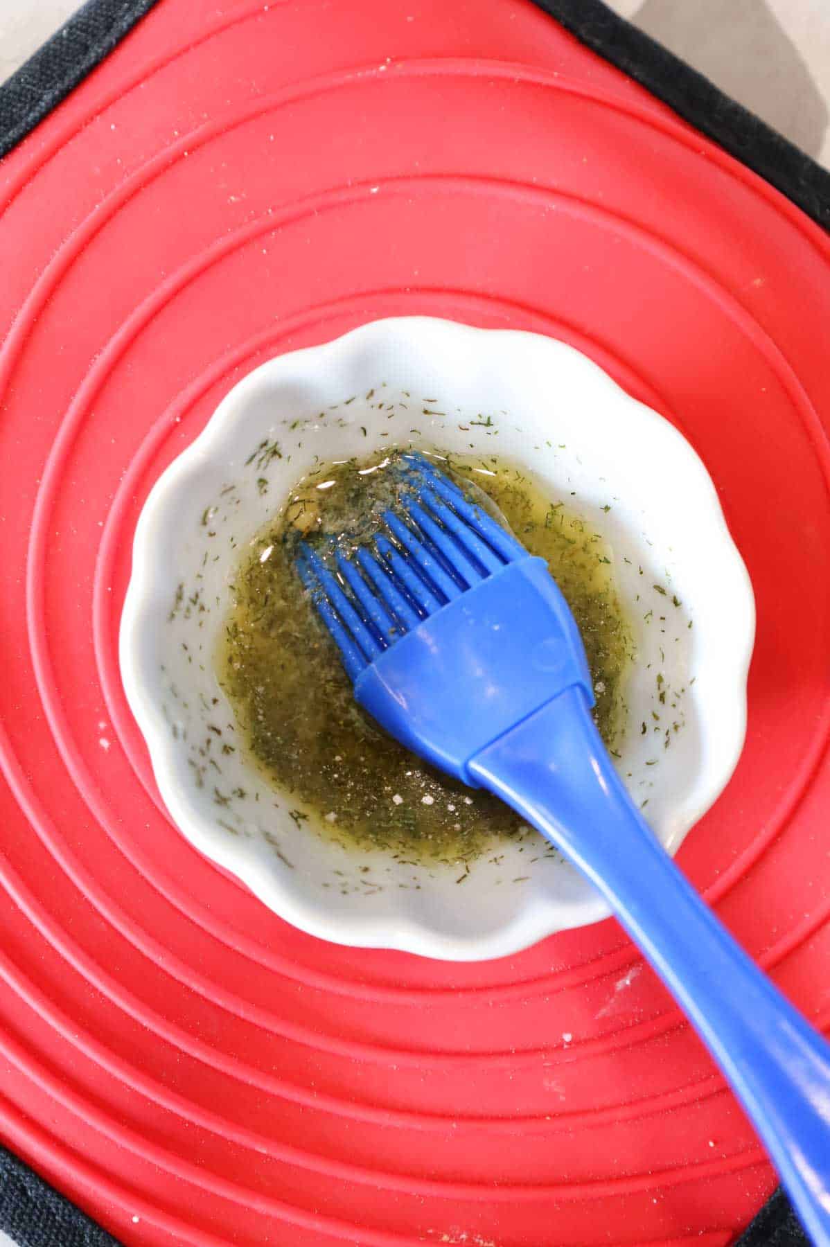 spices and melted butter being stirred together