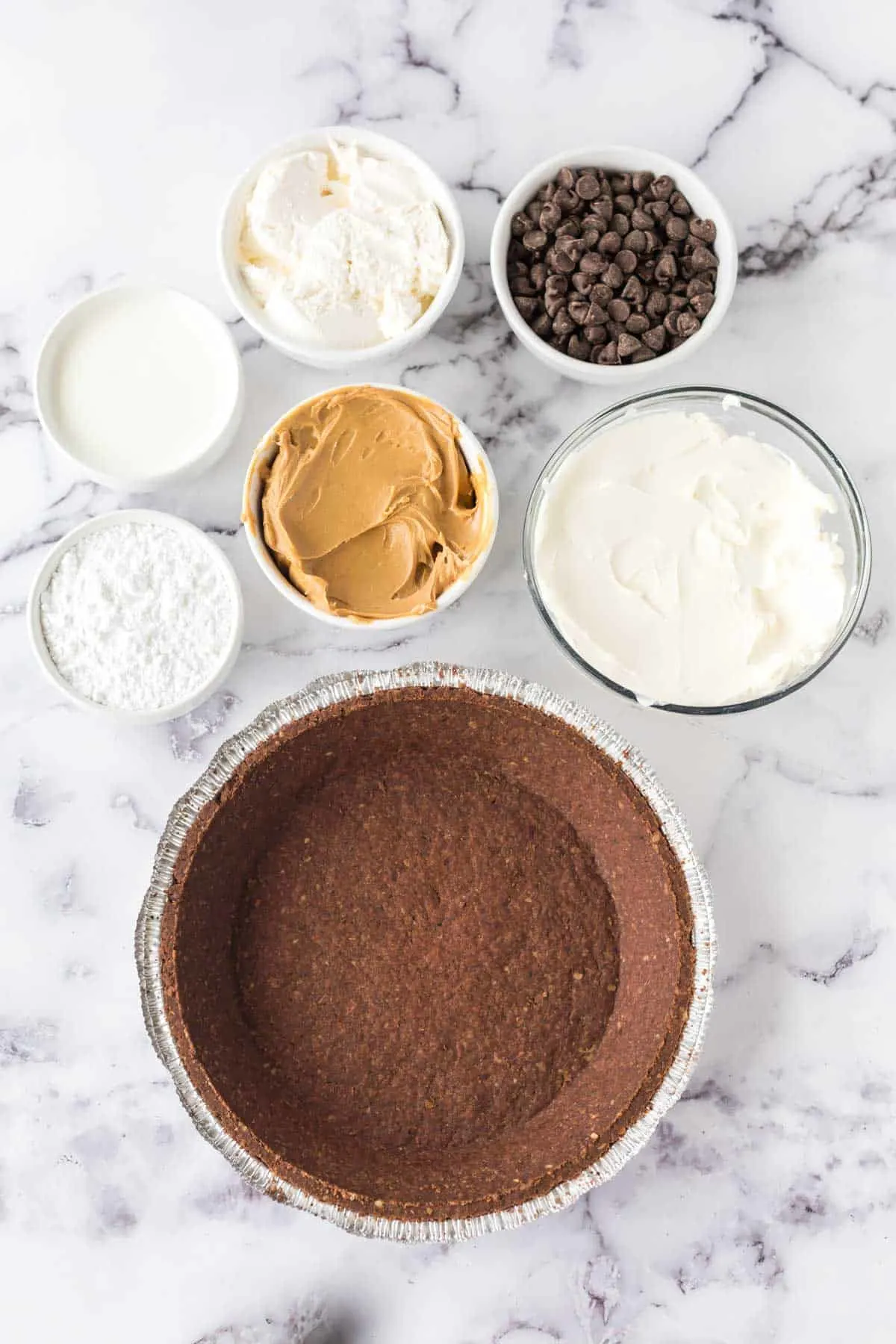 chocolate pie crust and other pie ingredients in prep bowls