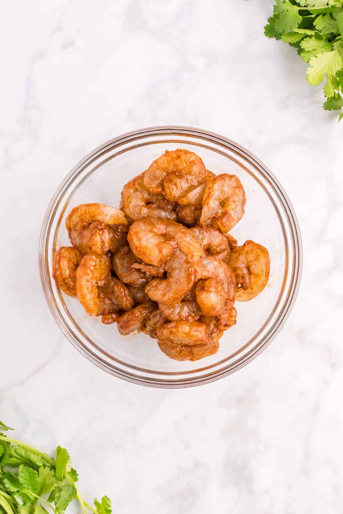 seasoned raw shrimp in a bowl