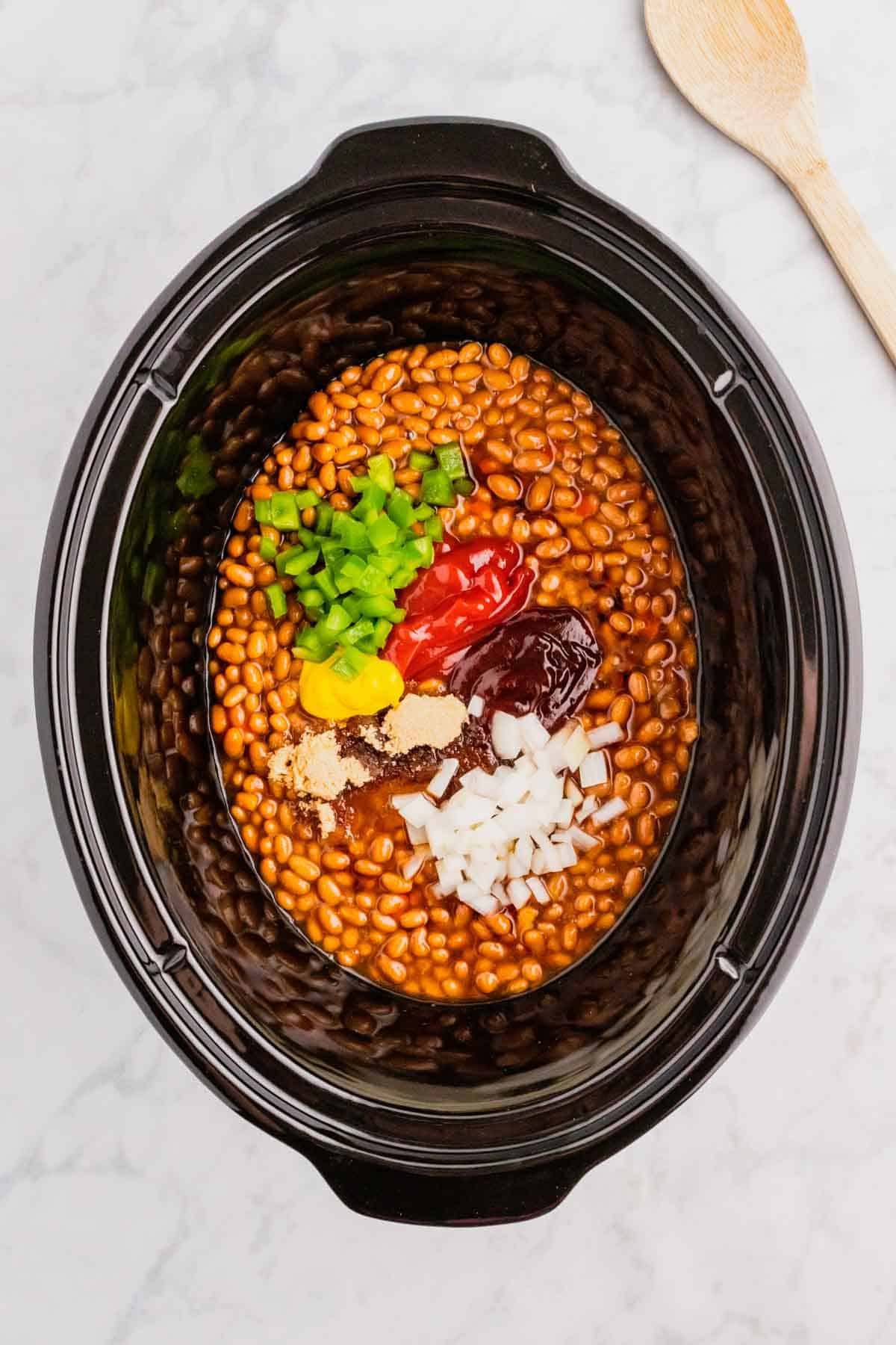 baked beans, diced onions, green peppers, ketchup, mustard and brown sugar in a crock pot