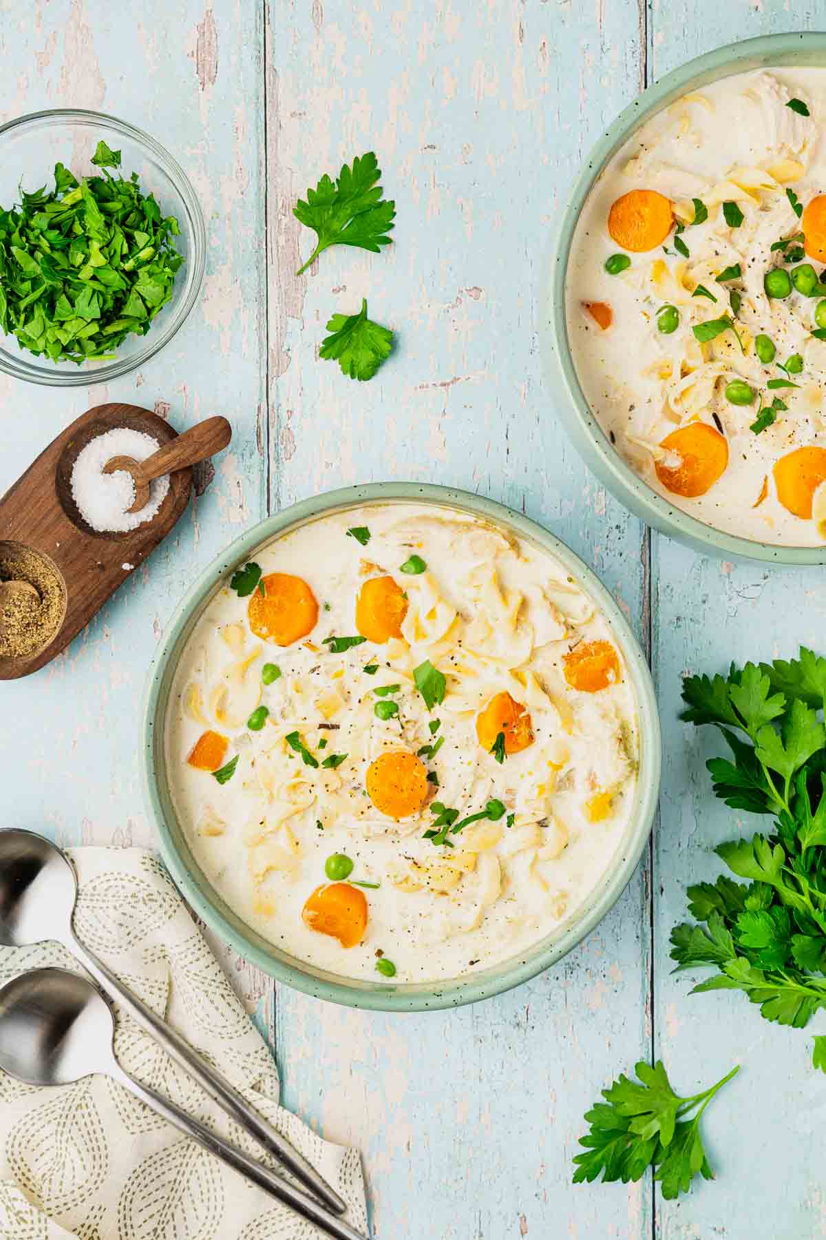 Crock Pot Creamy Chicken Noodle Soup is a hearty soup loaded with shredded chicken, veggies and egg noodles all in a creamy chicken chicken broth.