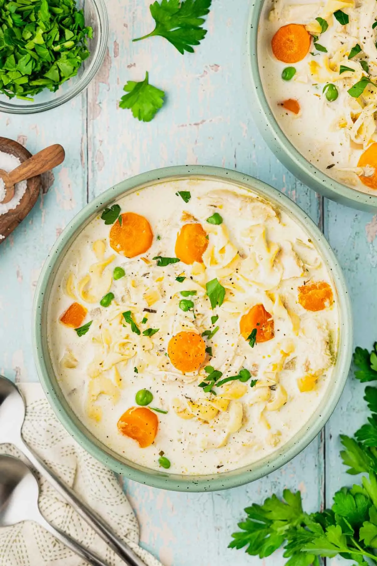 Crock Pot Creamy Chicken Noodle Soup is a hearty soup loaded with shredded chicken, veggies and egg noodles all in a creamy chicken chicken broth.