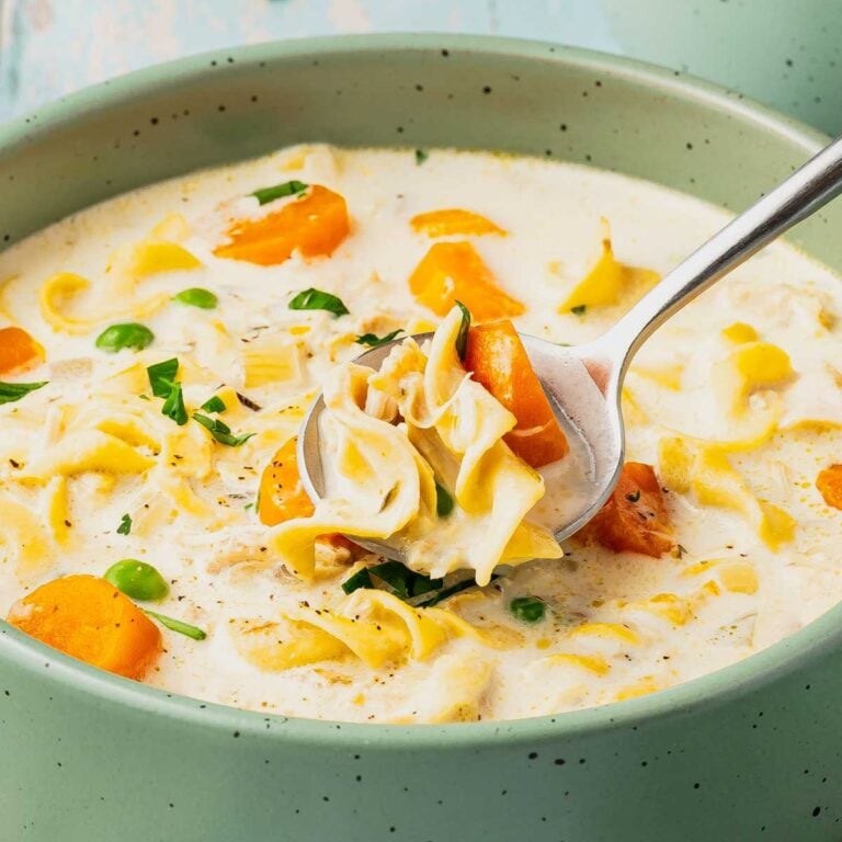 Crock Pot Creamy Chicken Noodle Soup is a hearty soup loaded with shredded chicken, veggies and egg noodles all in a creamy chicken chicken broth.