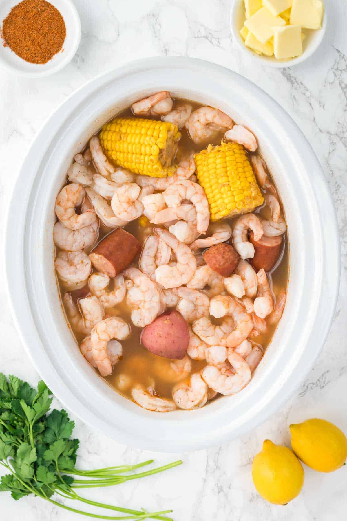 cooked shrimp, corn and sausage in a slow cooker