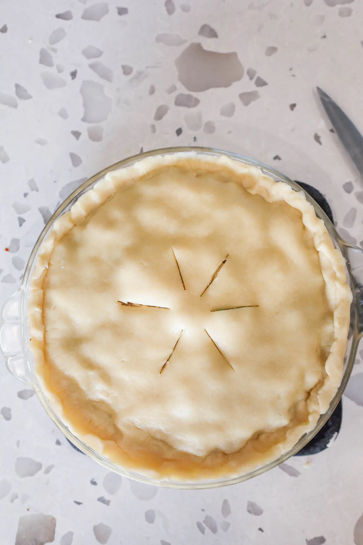 slits cut into top of pie crust before baking