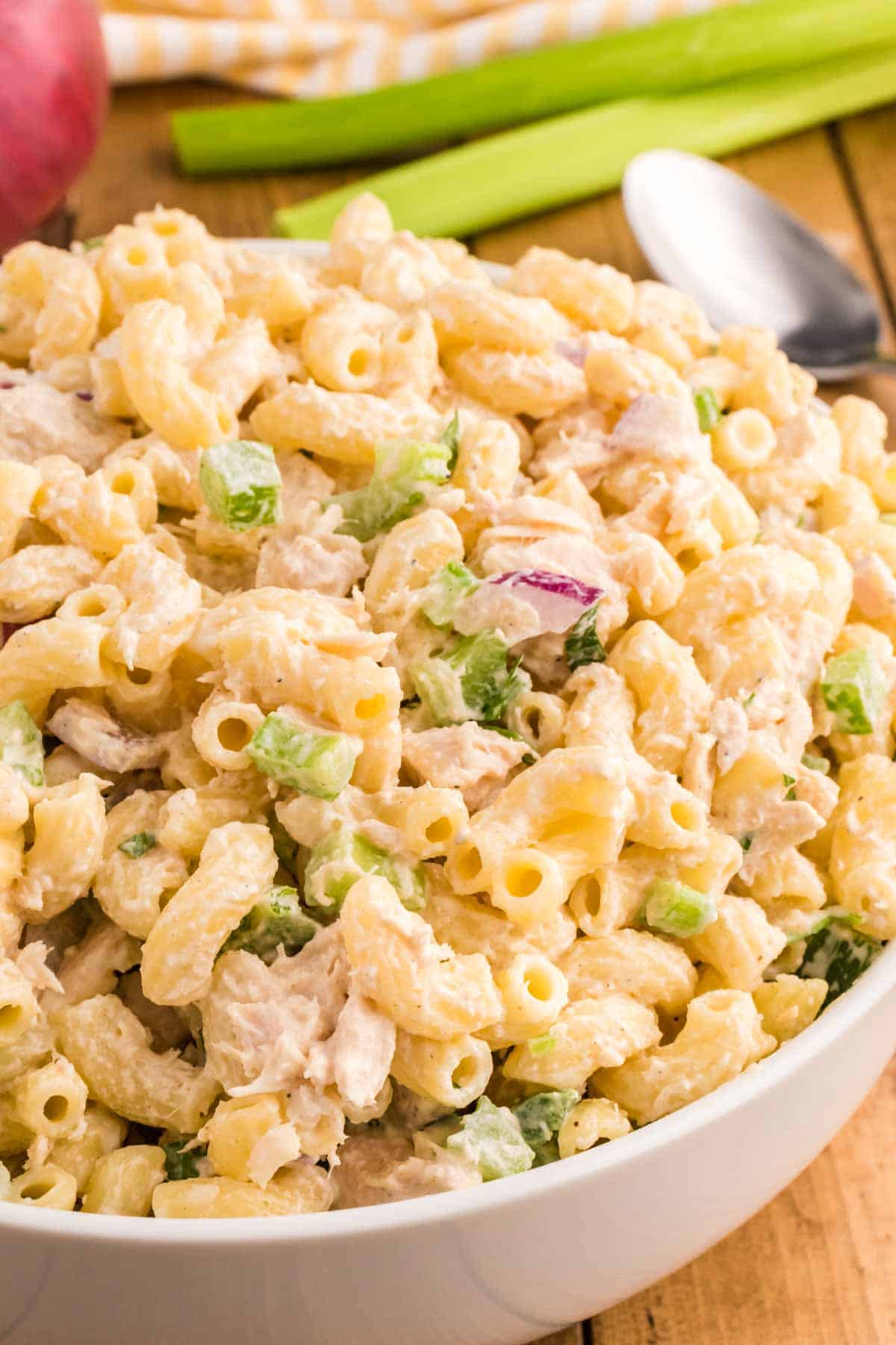 Tuna Macaroni Salad is a classic pasta salad recipe loaded with canned tuna, chopped celery, diced red onions and green peppers all tossed in a seasoned mayo dressing.