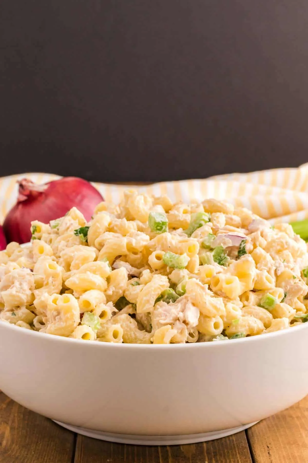 Tuna Macaroni Salad is a classic pasta salad recipe loaded with canned tuna, chopped celery, diced red onions and green peppers all tossed in a seasoned mayo dressing.