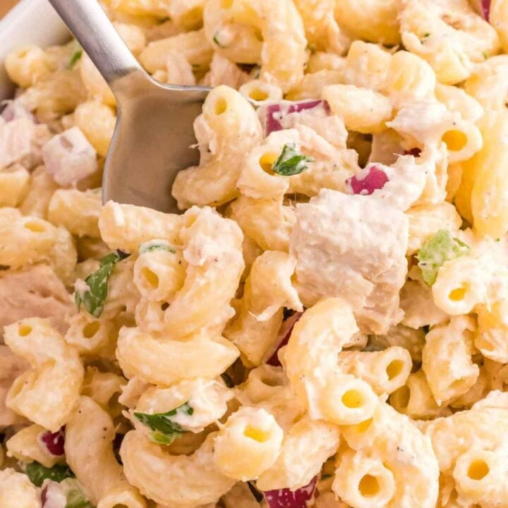 Tuna Macaroni Salad is a classic pasta salad recipe loaded with canned tuna, chopped celery, diced red onions and green peppers all tossed in a seasoned mayo dressing.