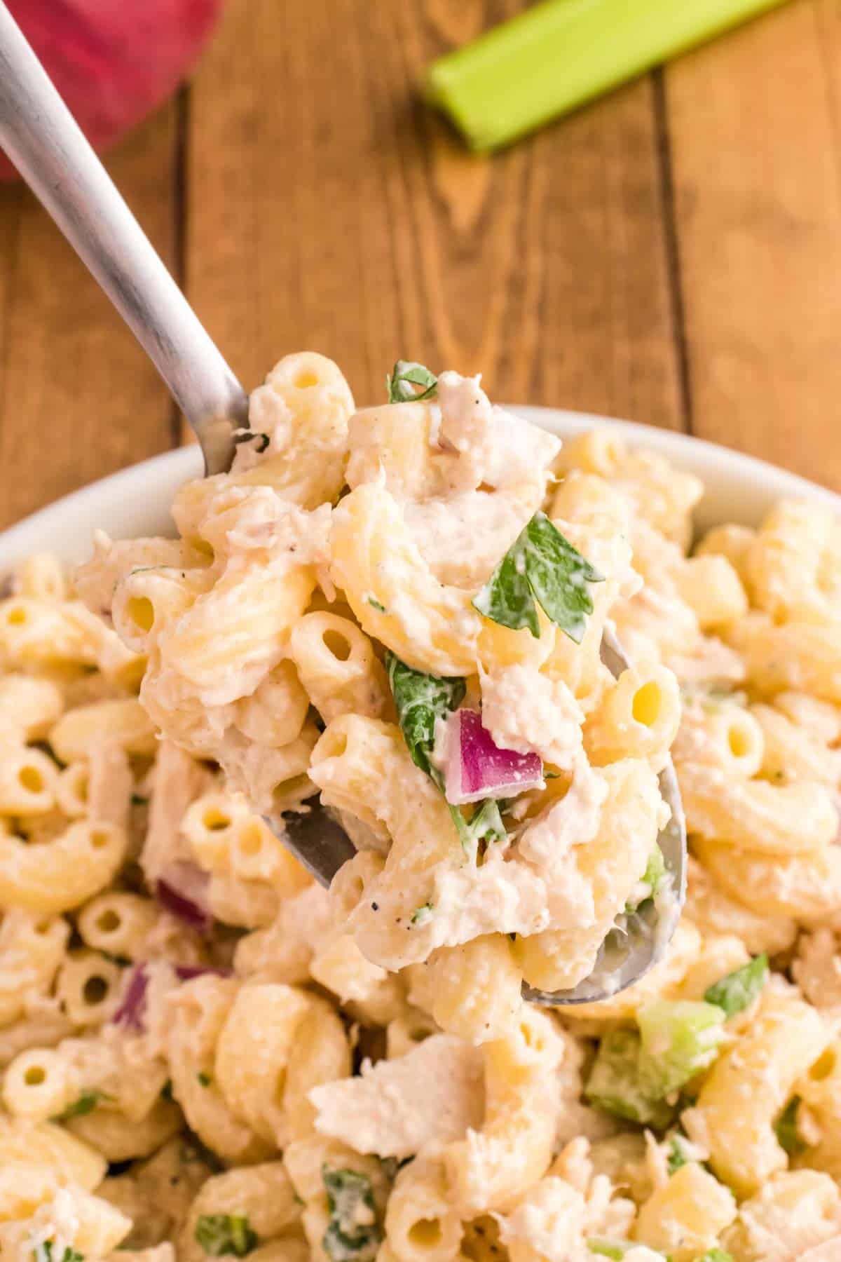 Tuna Macaroni Salad is a classic pasta salad recipe loaded with canned tuna, chopped celery, diced red onions and green peppers all tossed in a seasoned mayo dressing.