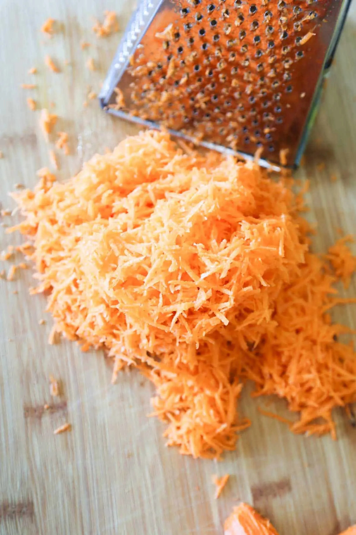 grated carrot on a cutting board