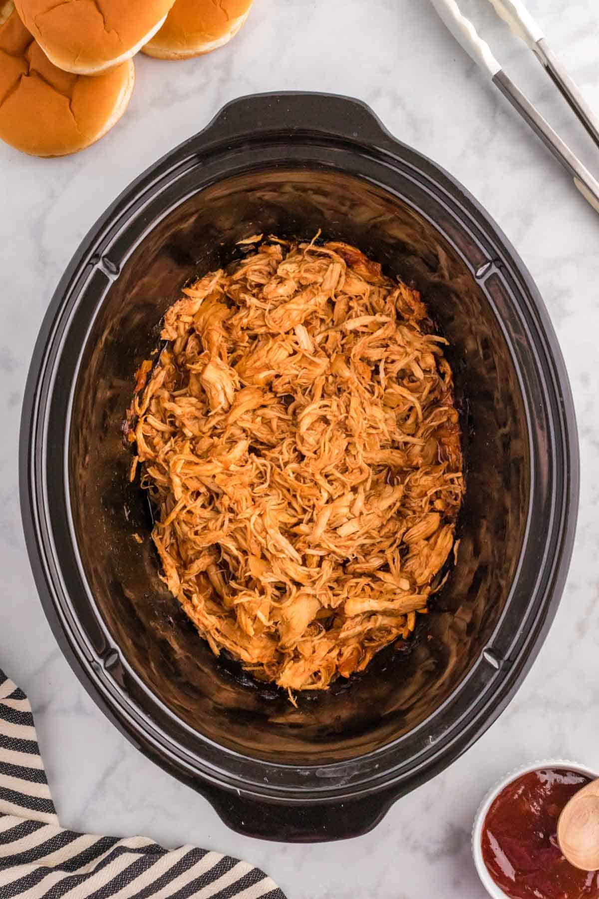 Crock Pot BBQ Chicken is a tender and flavourful shredded chicken recipe slow cooked in a BBQ sauce mixture.