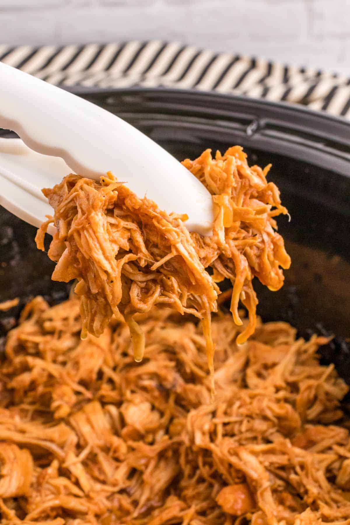 Crock Pot BBQ Chicken is a tender and flavourful shredded chicken recipe slow cooked in a BBQ sauce mixture.