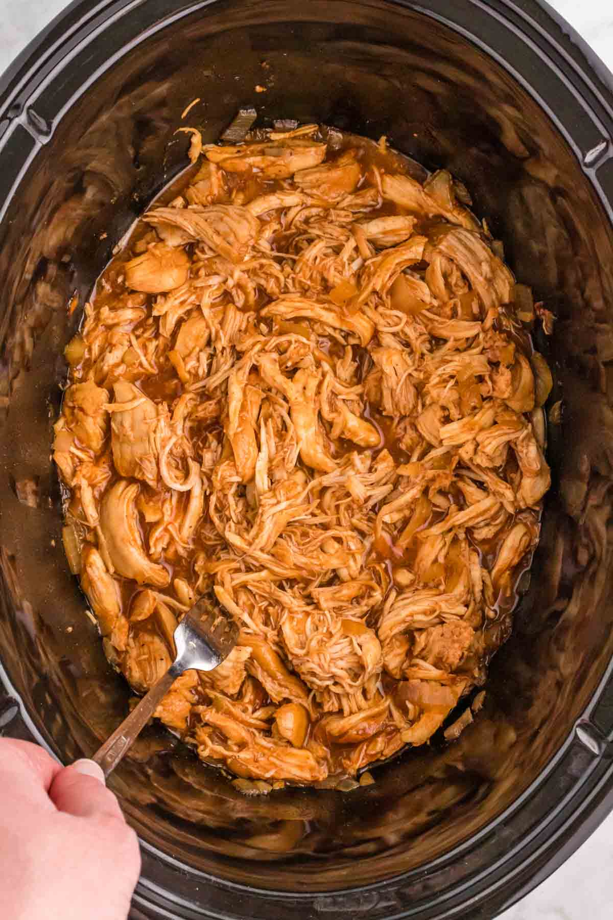 Crock Pot BBQ Chicken is a tender and flavourful shredded chicken recipe slow cooked in a BBQ sauce mixture.