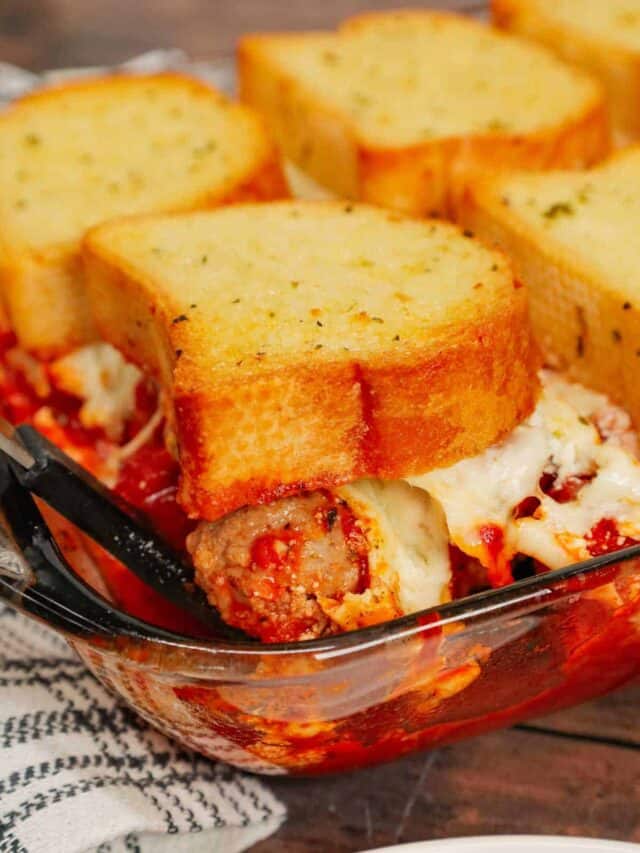 Dump and Bake Meatball Casserole is a hearty casserole made with frozen Italian meatballs, marinara sauce, diced tomatoes, ricotta and mozzarella and topped with frozen Texas toast garlic bread.