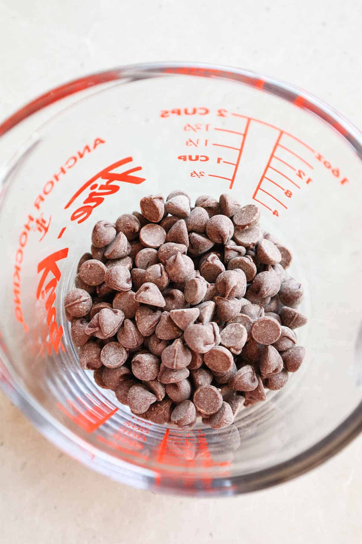 chocolate chips in a glass measuring cup