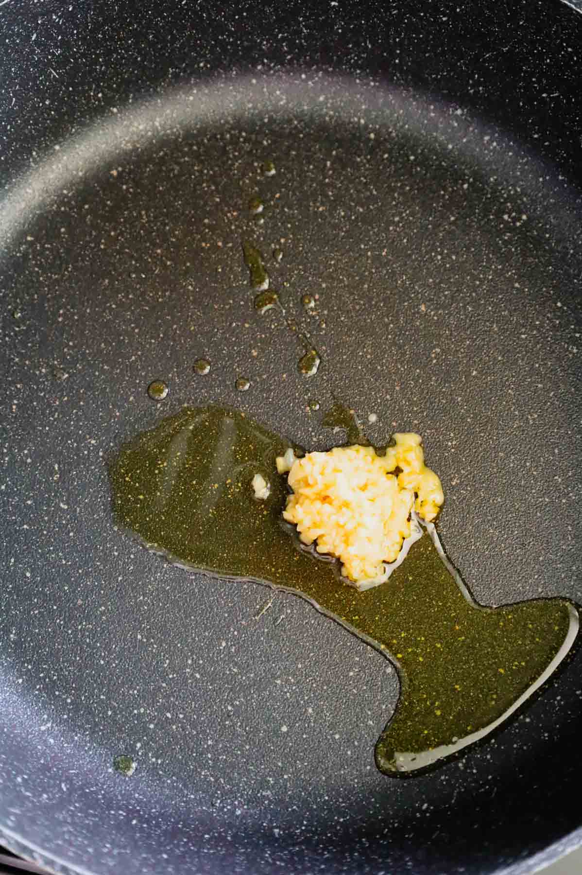 olive oil and minced garlic in a skillet