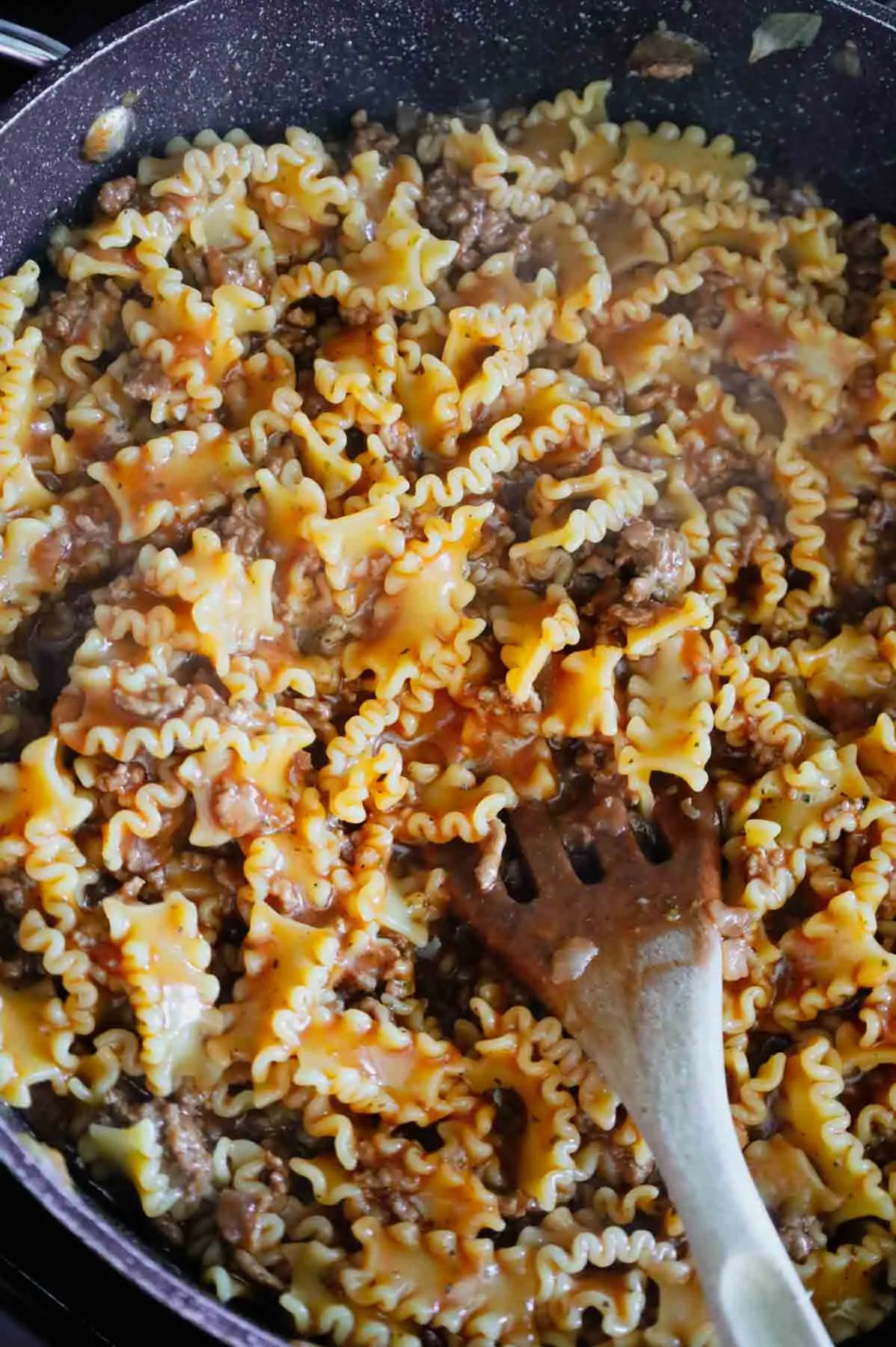 tomato pasta with ground beef in a skillet