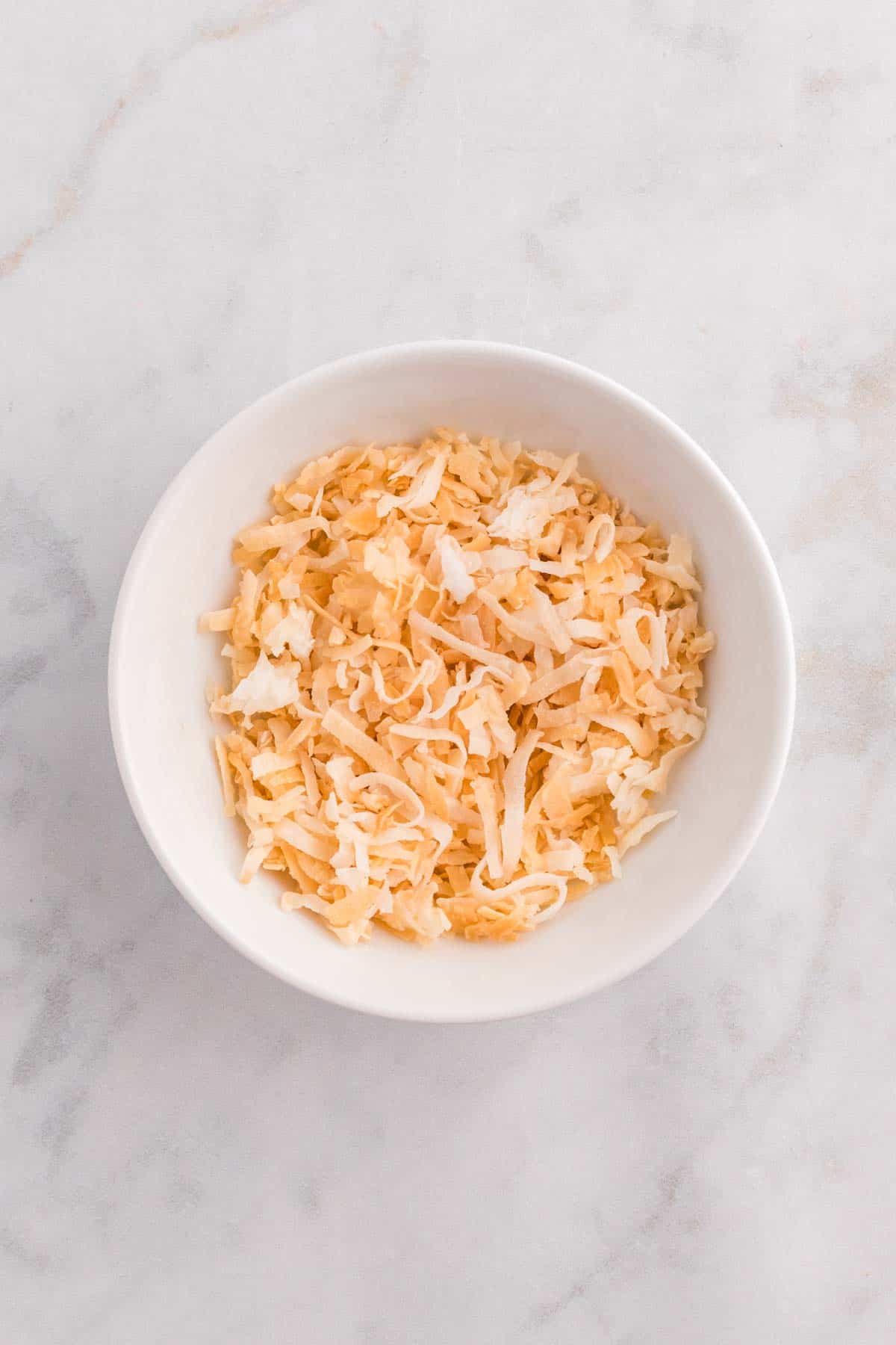 toasted coconut in a bowl