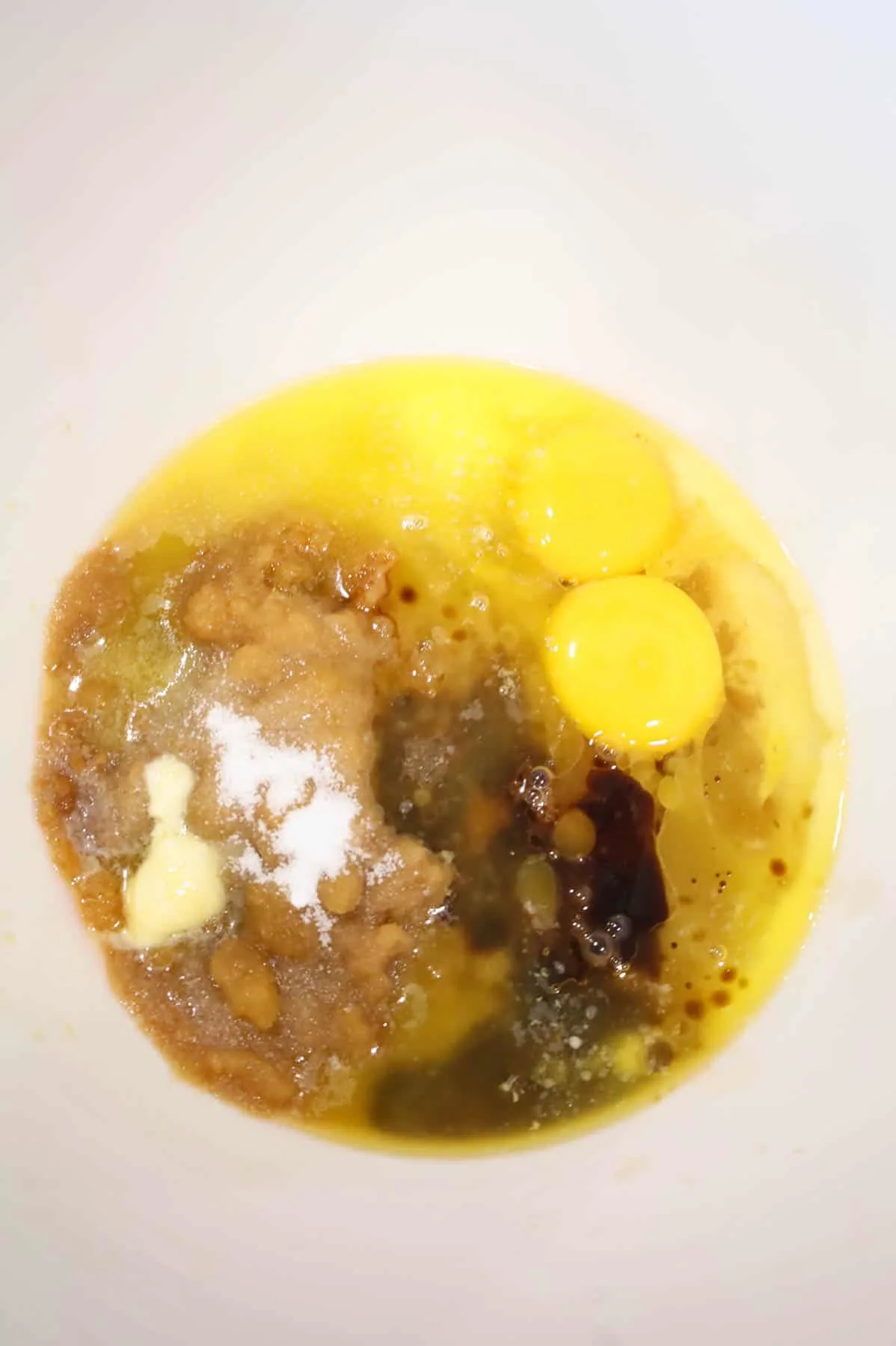 eggs, melted butter, vanilla, salt and brown sugar in a mixing bowl