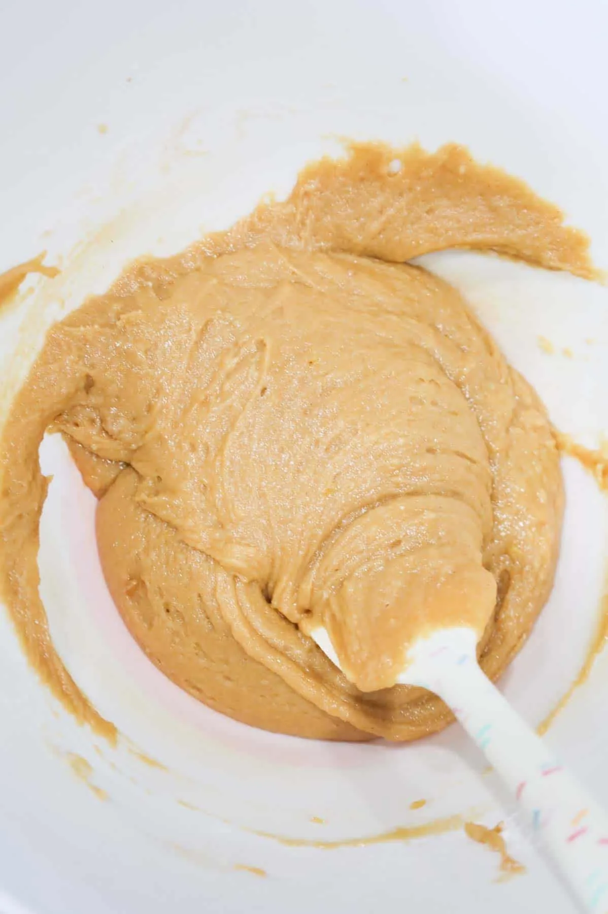 peanut butter blondie batter in a mixing bowl