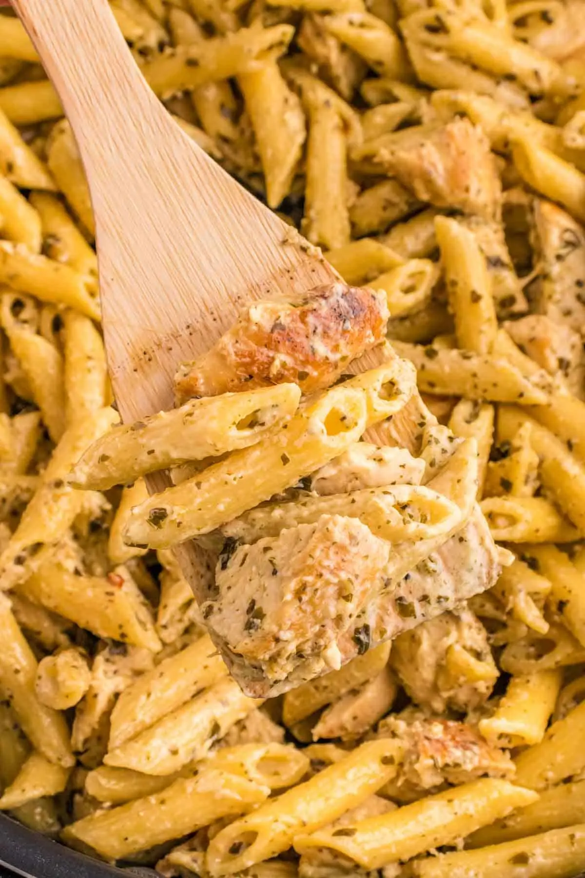 Pesto Chicken Pasta is a flavourful pasta recipe loaded with seasoned chicken breast chunks, basil pesto, heavy cream and topped with roasted pine nuts.