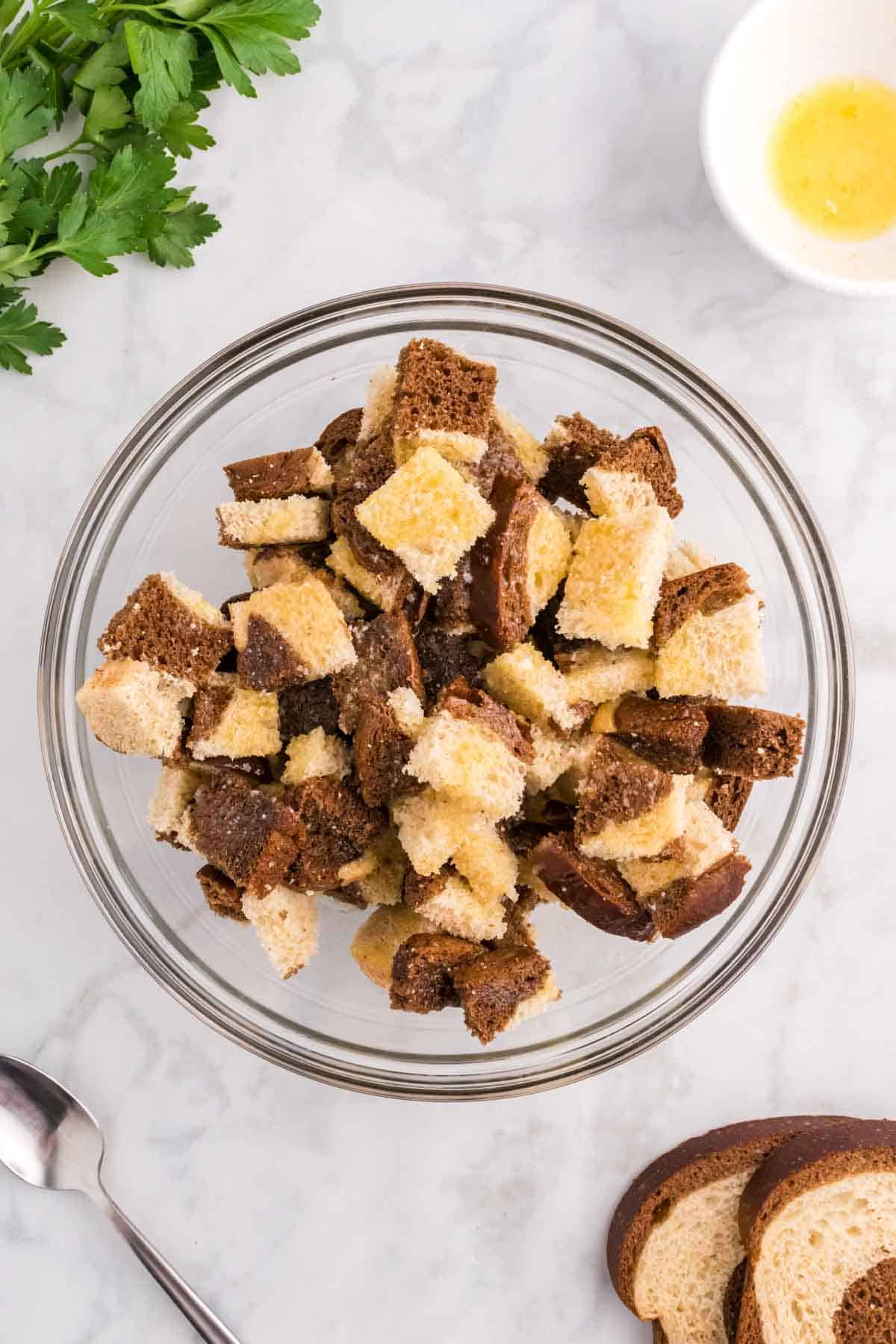 marble rye bread cubes in a large bowl