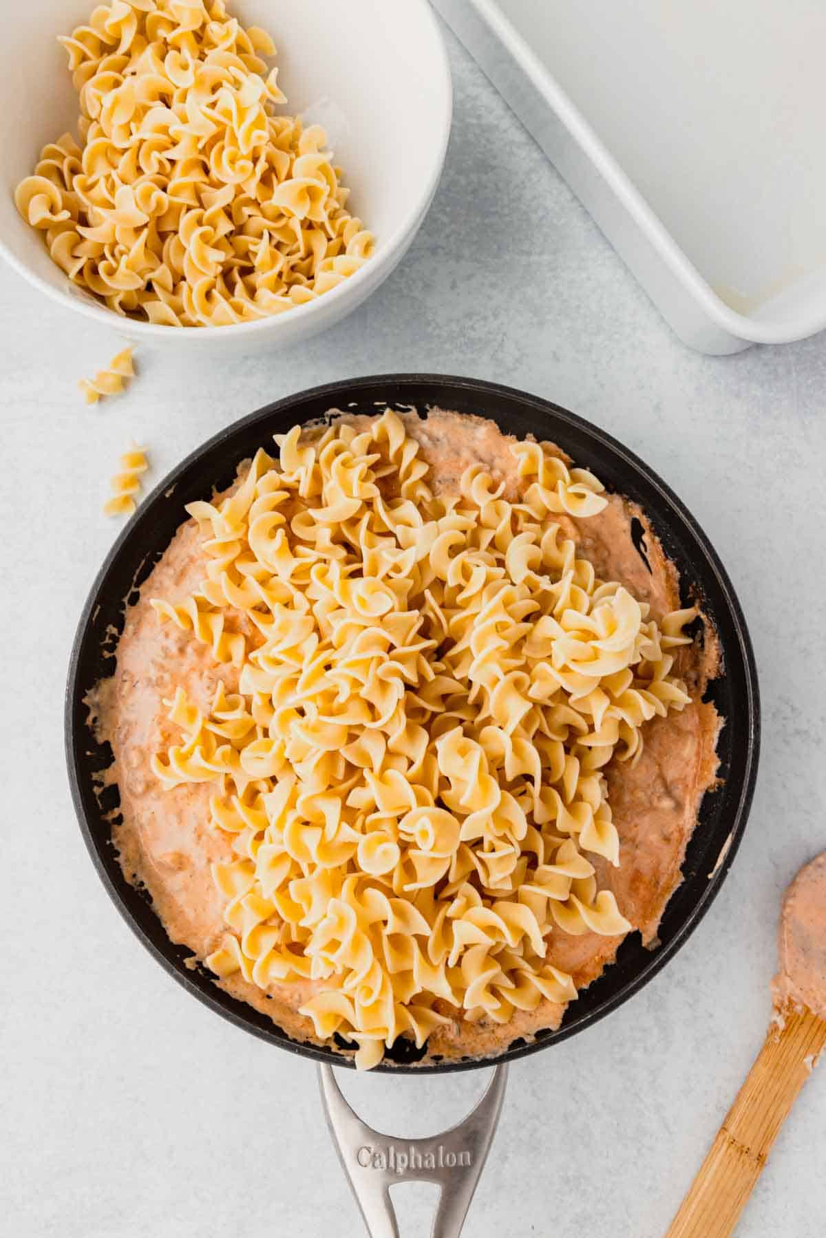 egg noodles added to skillet with ground beef and soup mixture