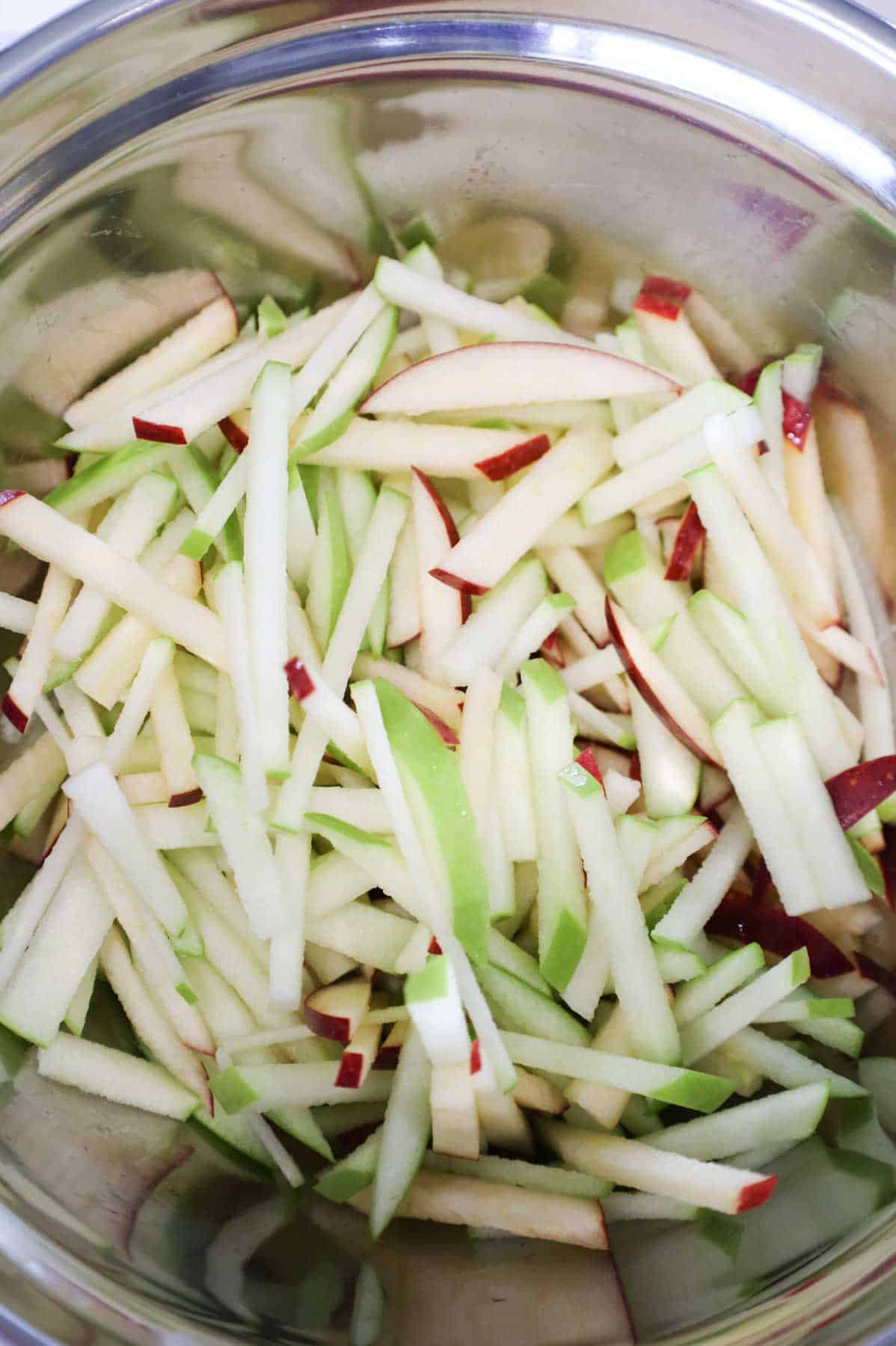 matchstick cut apples in a bowl