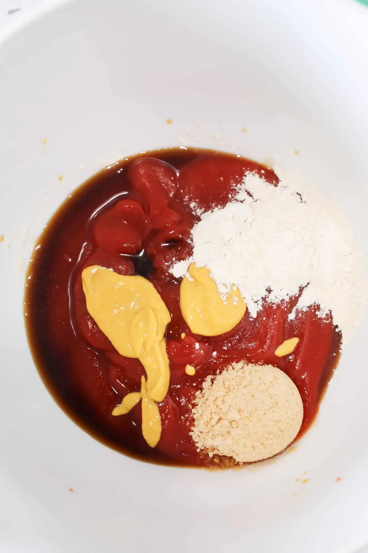 brown sugar, onion powder, mustard, Worcestershire sauce and ketchup in a bowl
