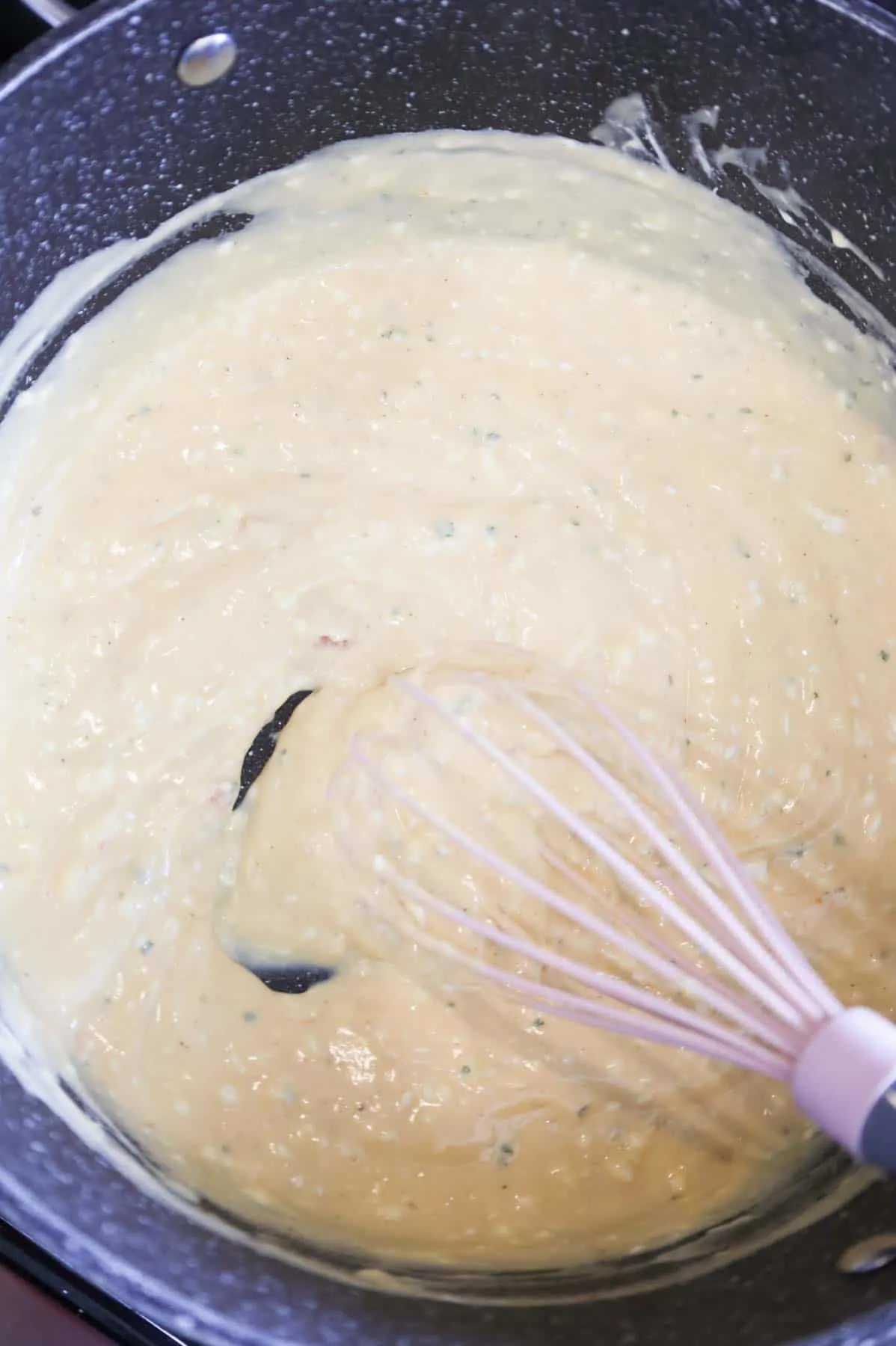 cream soup, cream cheese and ranch dressing mix mixture in a pot