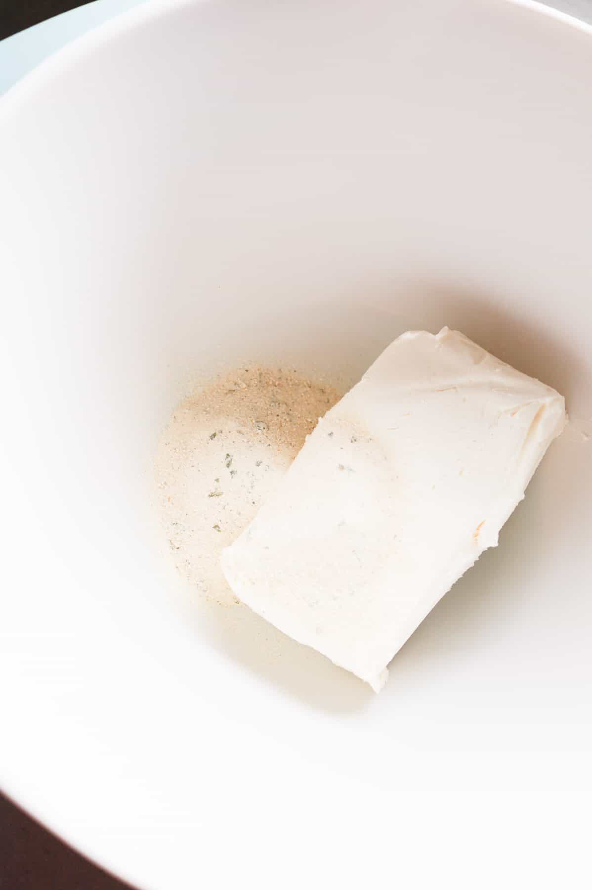 cream cheese, ranch dressing mix and milk in a mixing bowl