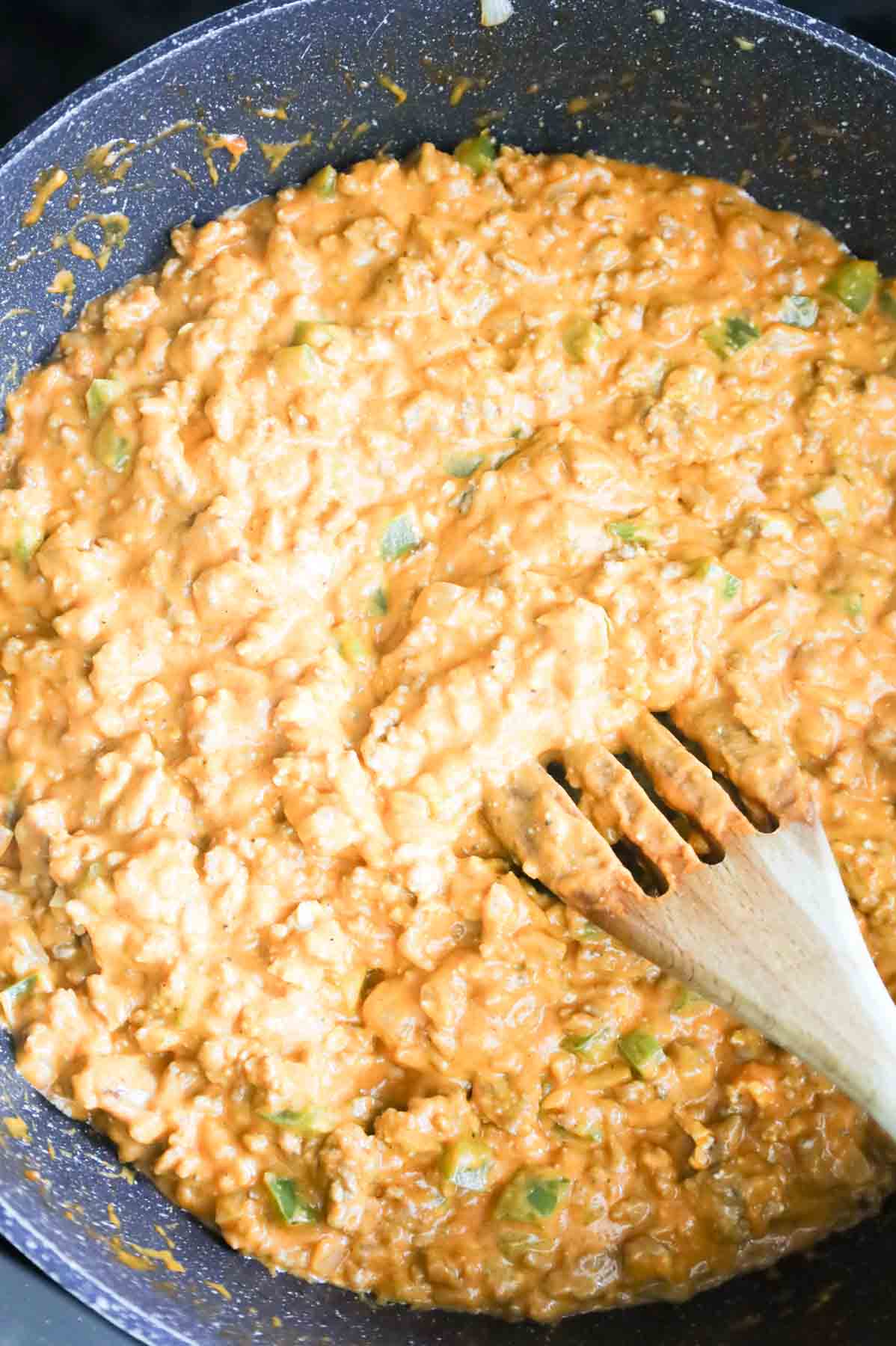 cream cheese, tomato soup and beef mixture in a skillet