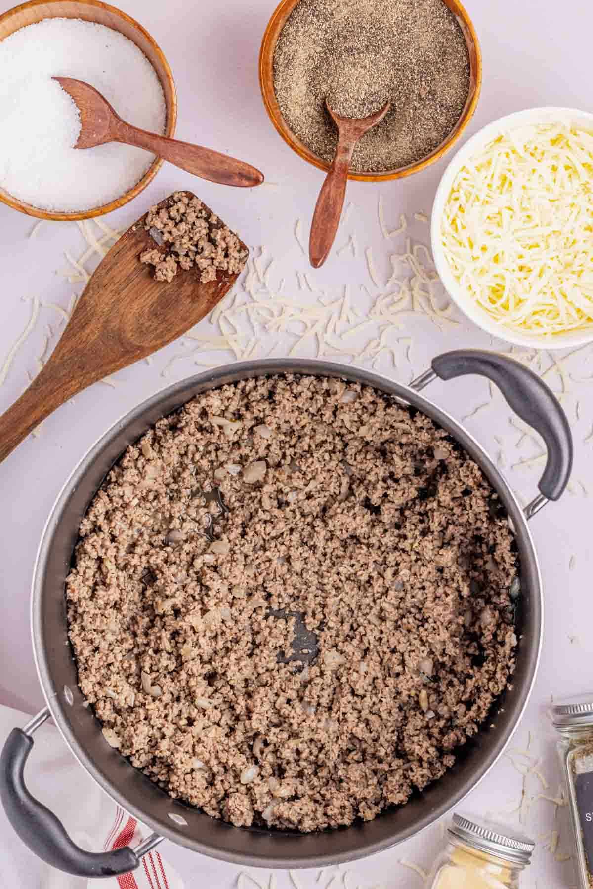 cooked ground beef in a skillet