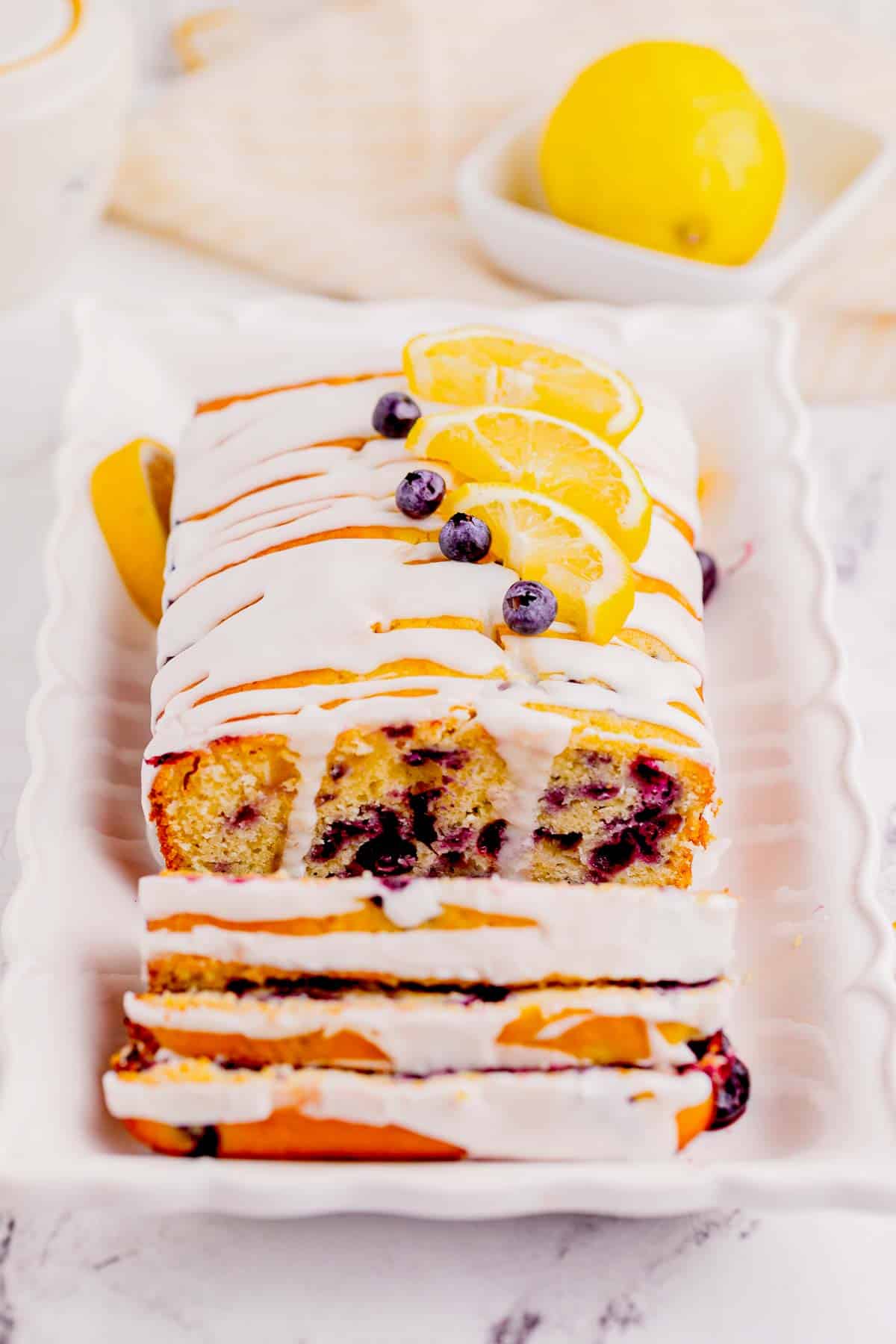 Lemon Blueberry Loaf is a delicious baked treat that combines the tangy flavor of lemons with the sweet burst of blueberries and is perfect for serving at brunch or as a dessert.