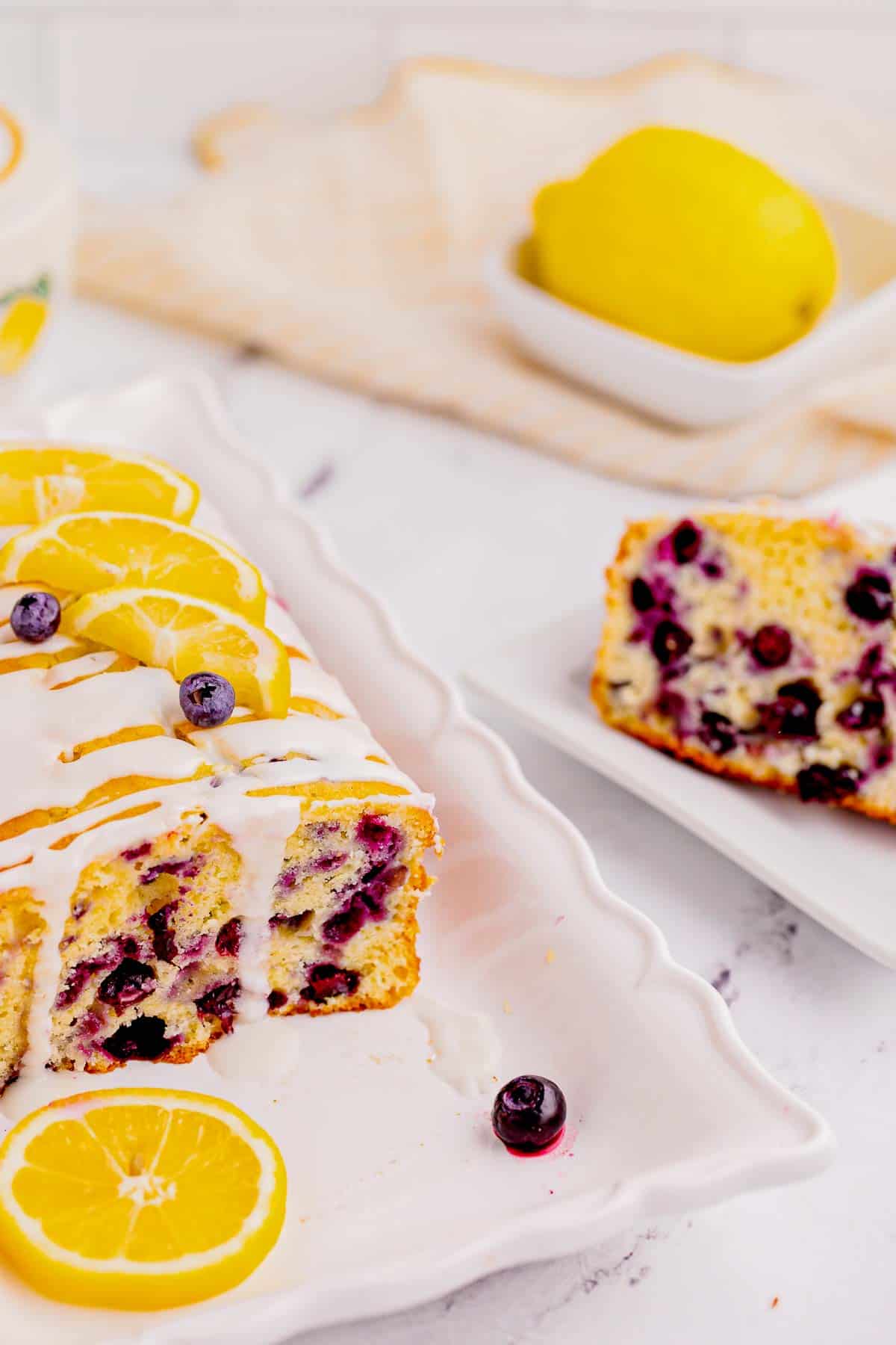 Lemon Blueberry Loaf is a delicious baked treat that combines the tangy flavor of lemons with the sweet burst of blueberries and is perfect for serving at brunch or as a dessert.