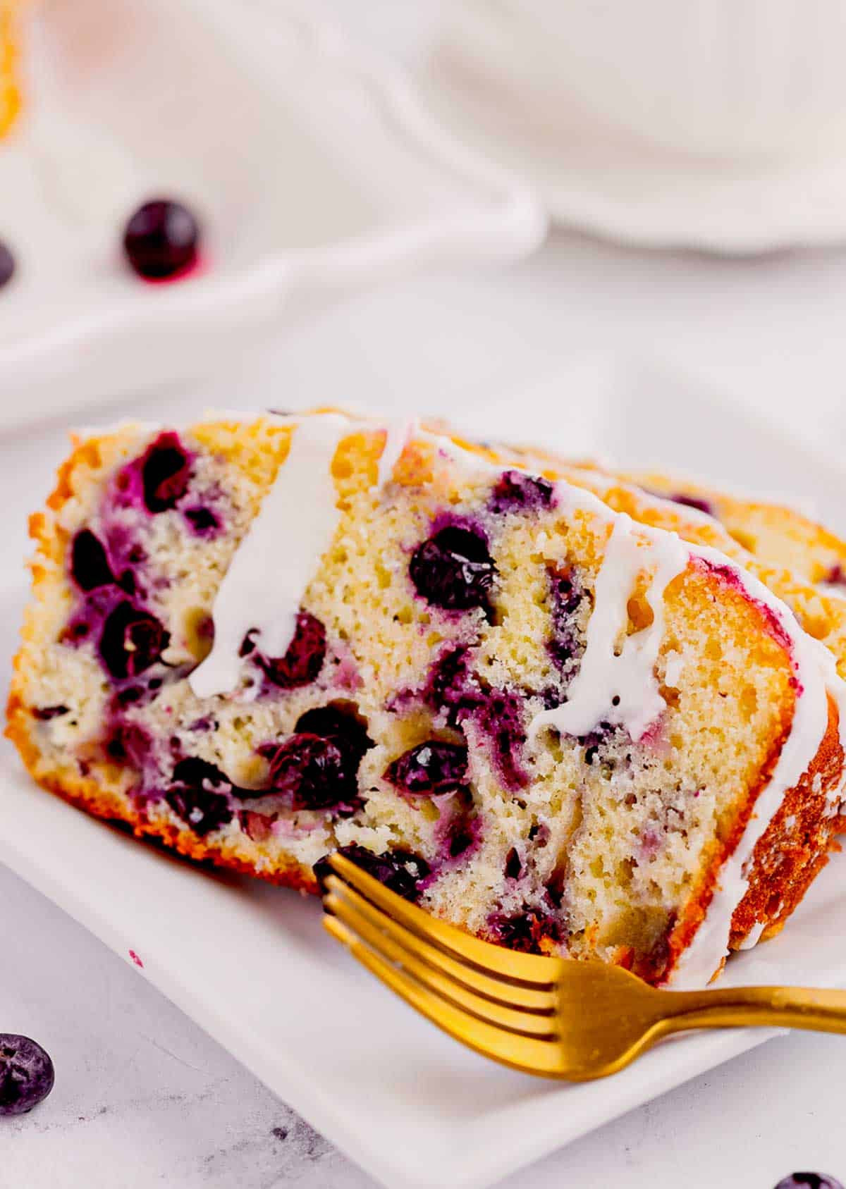 Lemon Blueberry Loaf is a delicious baked treat that combines the tangy flavor of lemons with the sweet burst of blueberries and is perfect for serving at brunch or as a dessert.