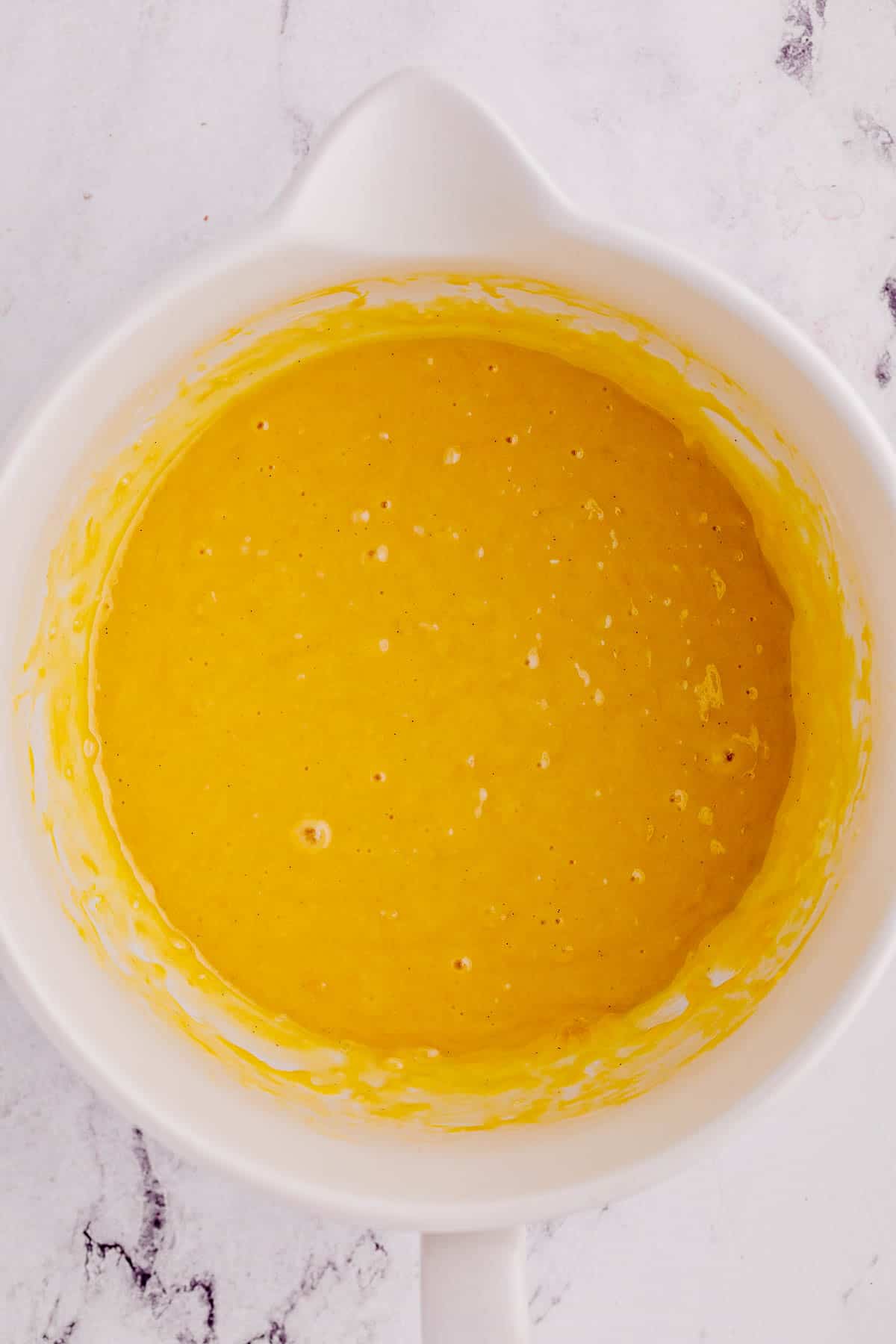 lemon loaf batter in a bowl