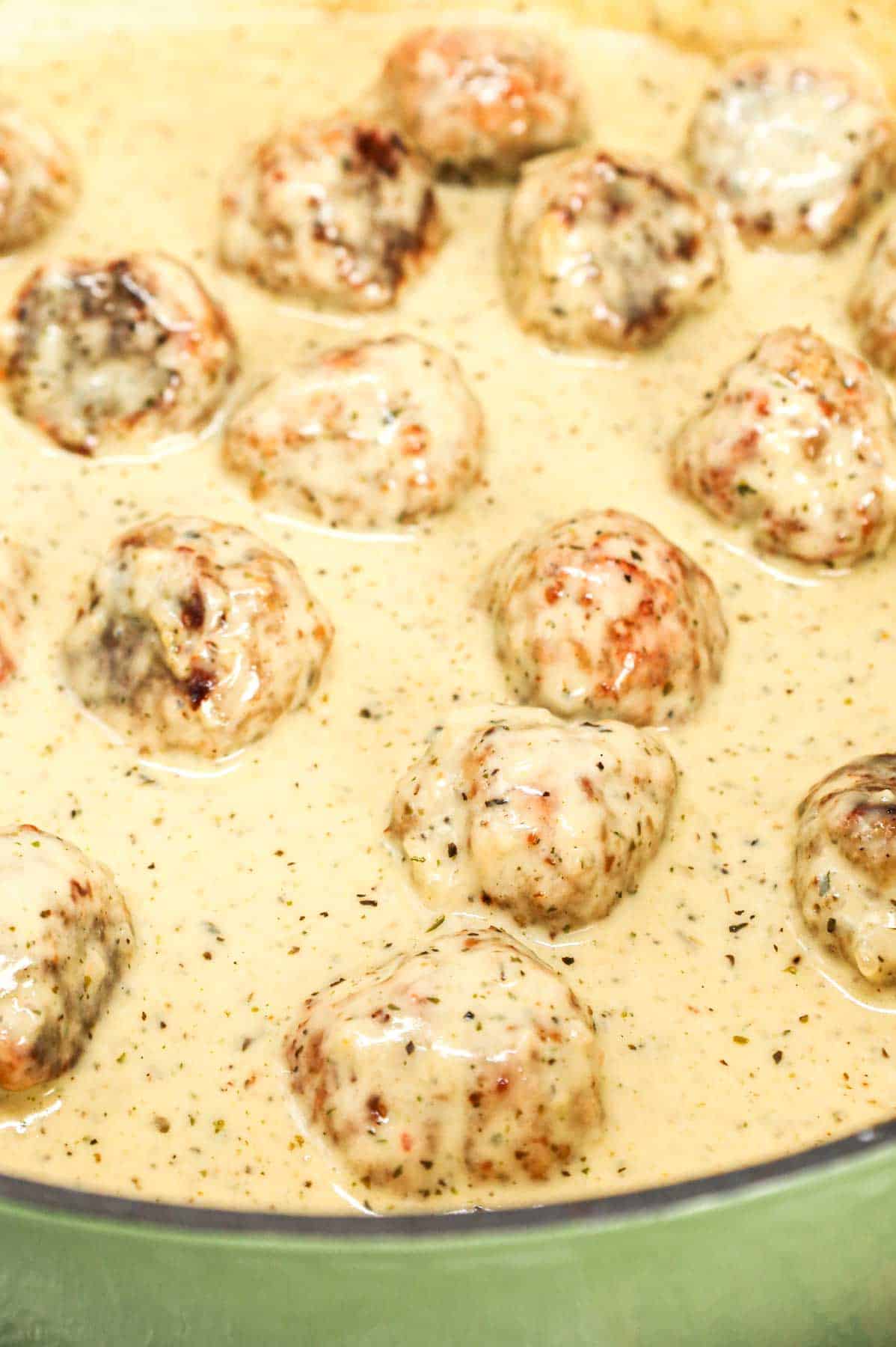 Alfredo Meatballs are an easy ground chicken meatball recipe loaded with Italian seasoned bread crumbs, garlic powder and parmesan cheese and tossed in a rich and creamy alfredo sauce.