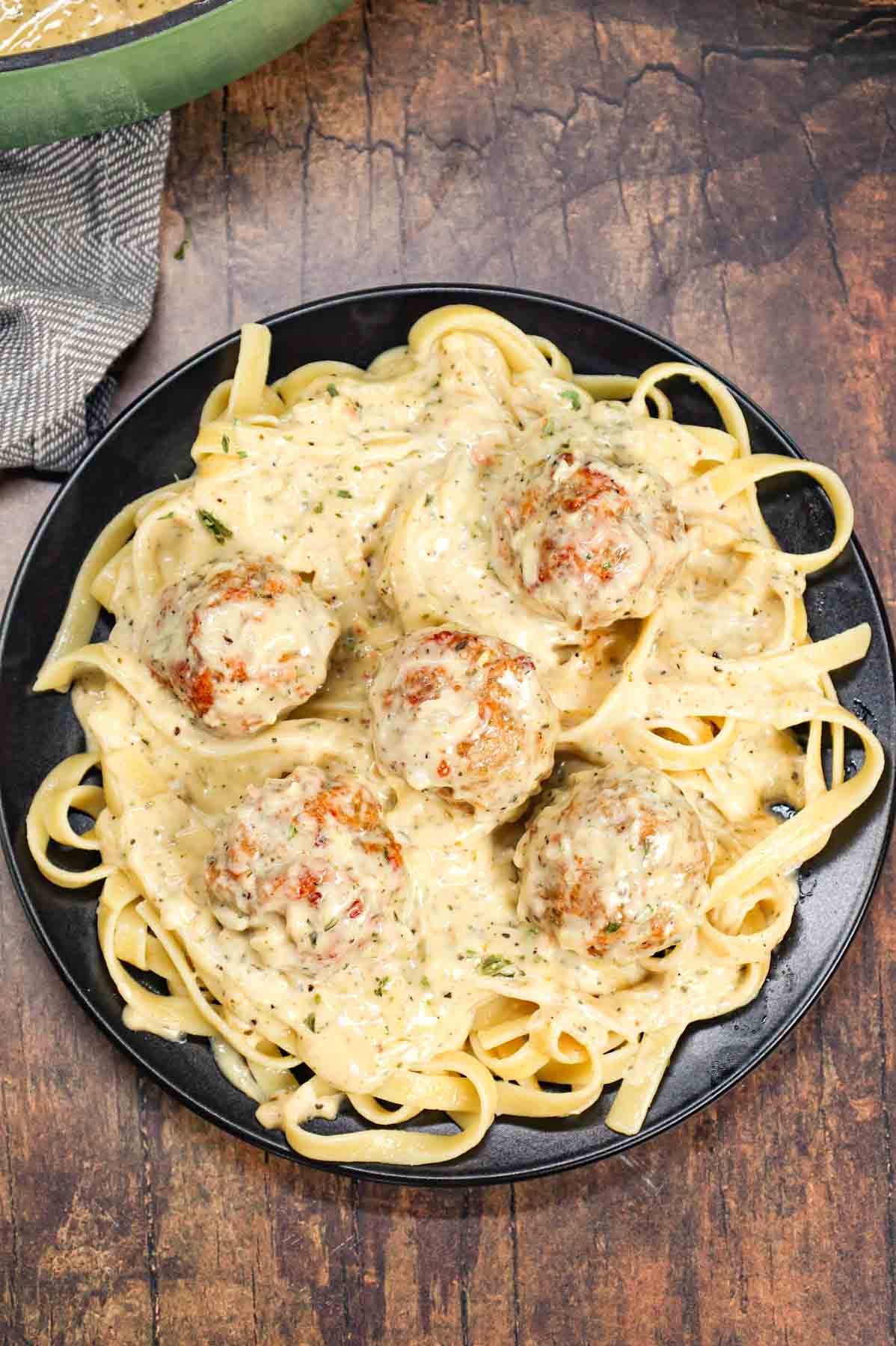 Alfredo Meatballs are an easy ground chicken meatball recipe loaded with Italian seasoned bread crumbs, garlic powder and parmesan cheese and tossed in a rich and creamy alfredo sauce.